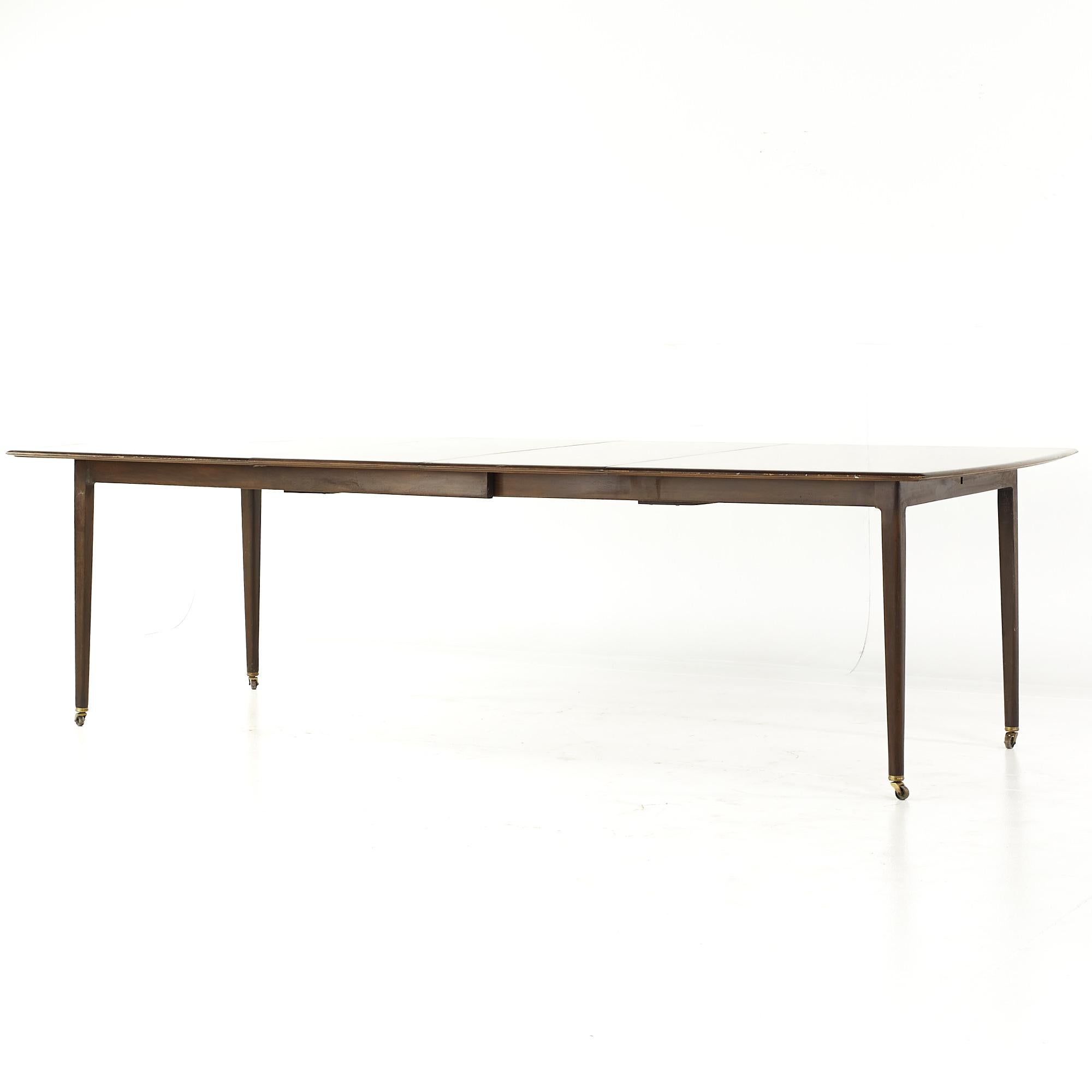 Dunbar Mid Century Expanding Hidden Leaf Walnut Dining Table with 2 Leaves For Sale 5