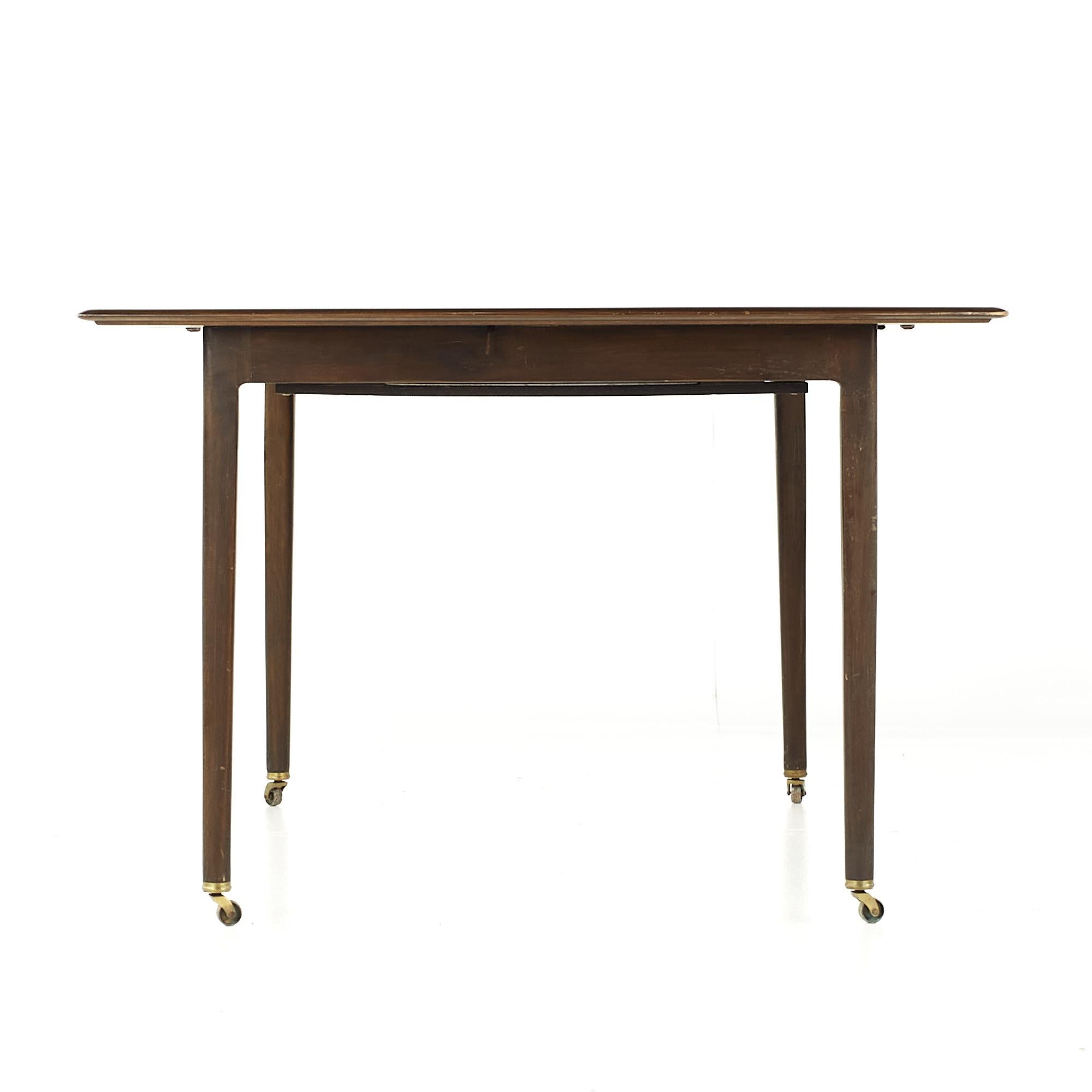 Mid-Century Modern Dunbar Mid Century Expanding Hidden Leaf Walnut Dining Table with 2 Leaves For Sale