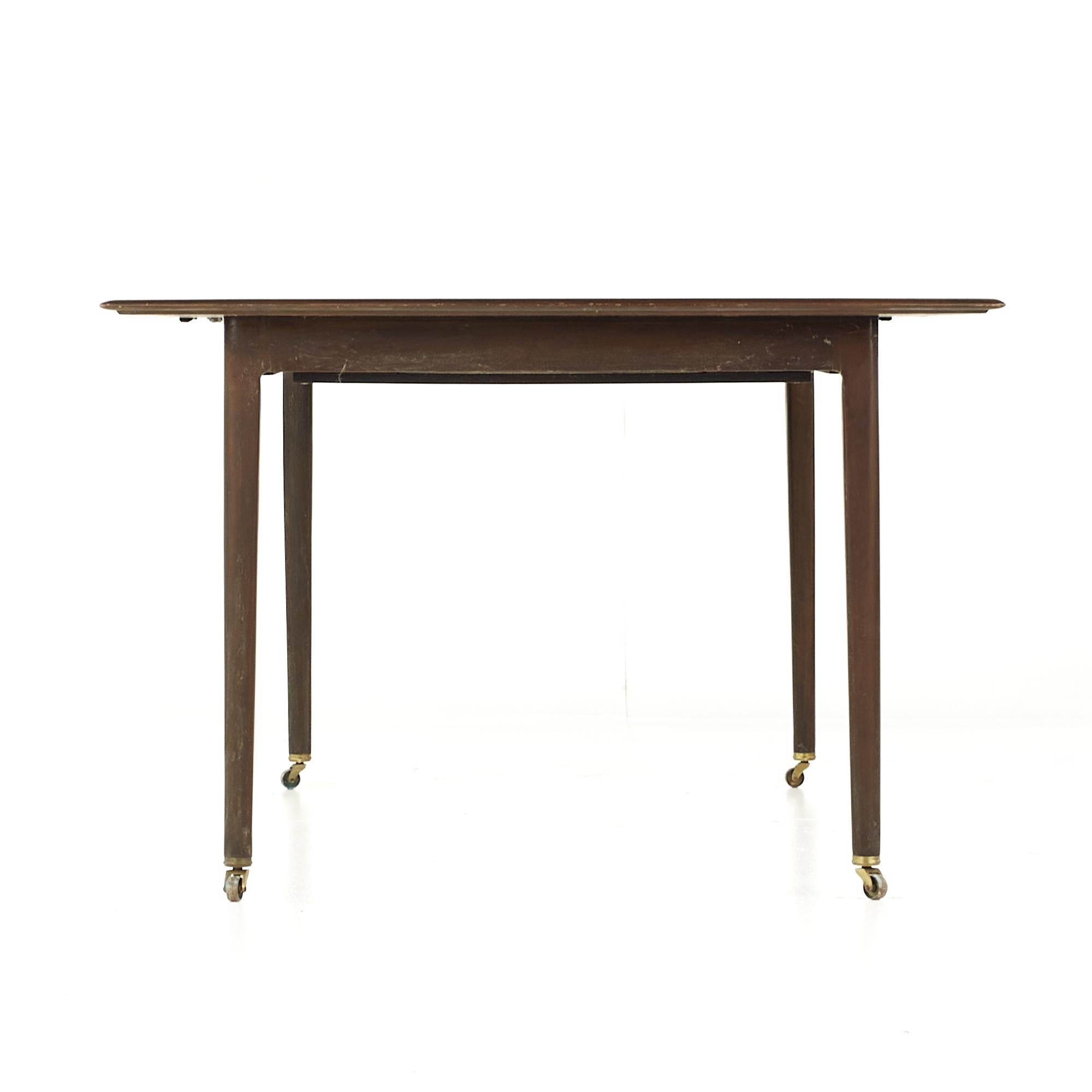 American Dunbar Mid Century Expanding Hidden Leaf Walnut Dining Table with 2 Leaves For Sale