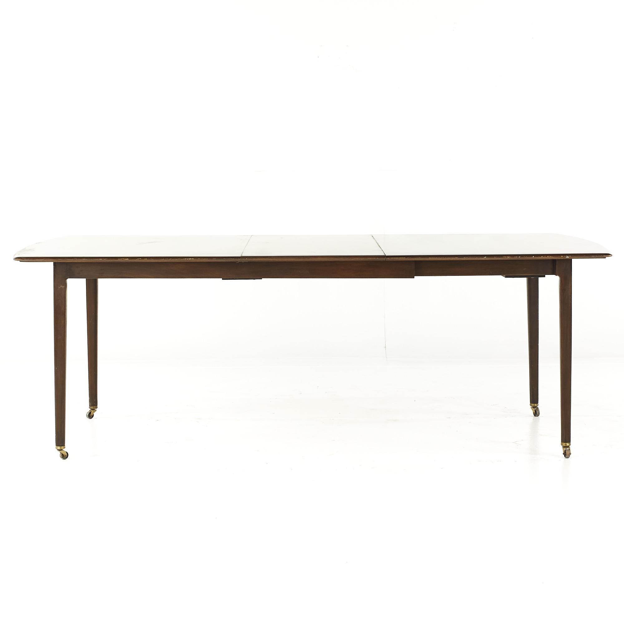 Dunbar Mid Century Expanding Hidden Leaf Walnut Dining Table with 2 Leaves For Sale 1
