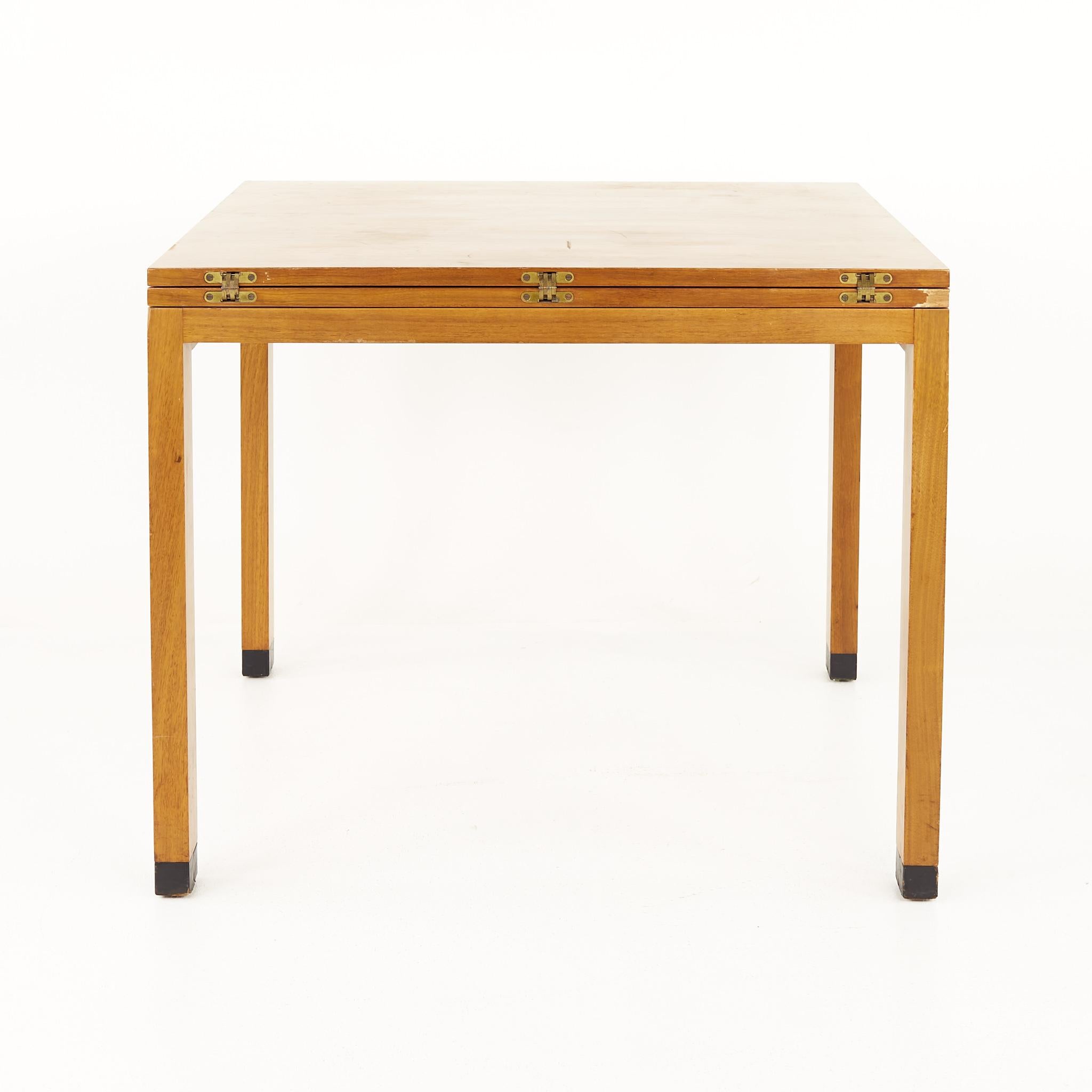 Dunbar mid century flip top dining game table

This table measures: 36 wide x 36 deep x 29.25 inches high, with a chair clearance of 25.75 inches, the maximum table width when unfolded is 64 inches

All pieces of furniture can be had in what we