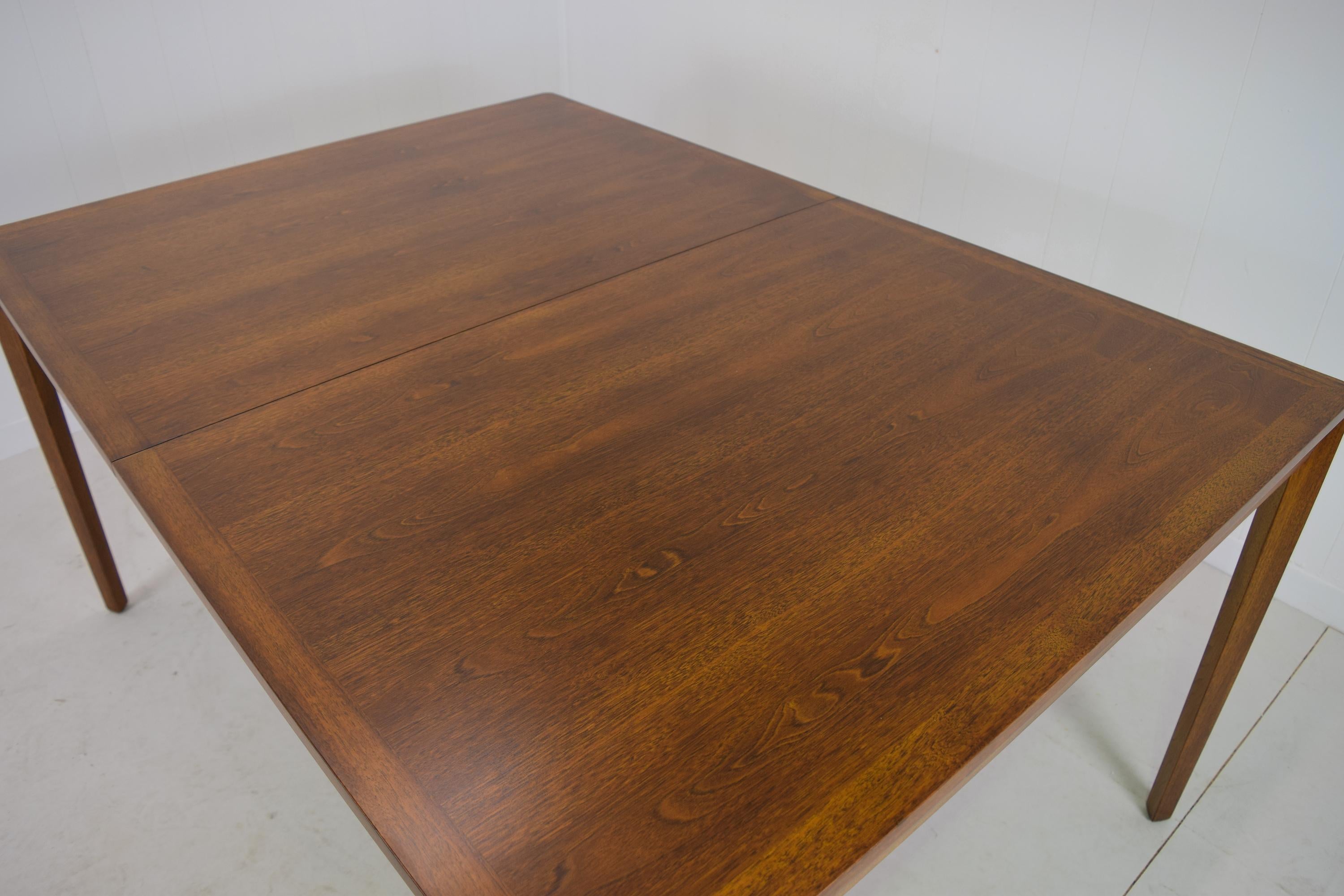 Model 456, Dunbar, USA
circa 1945-1955
All walnut
Refinished entirely with new satin finish
Measures: 42 deep and 28.25 tall, either 60 standard, 80 or 100 inches long with leafs.

This model is less common from Dunbar and comes standard with