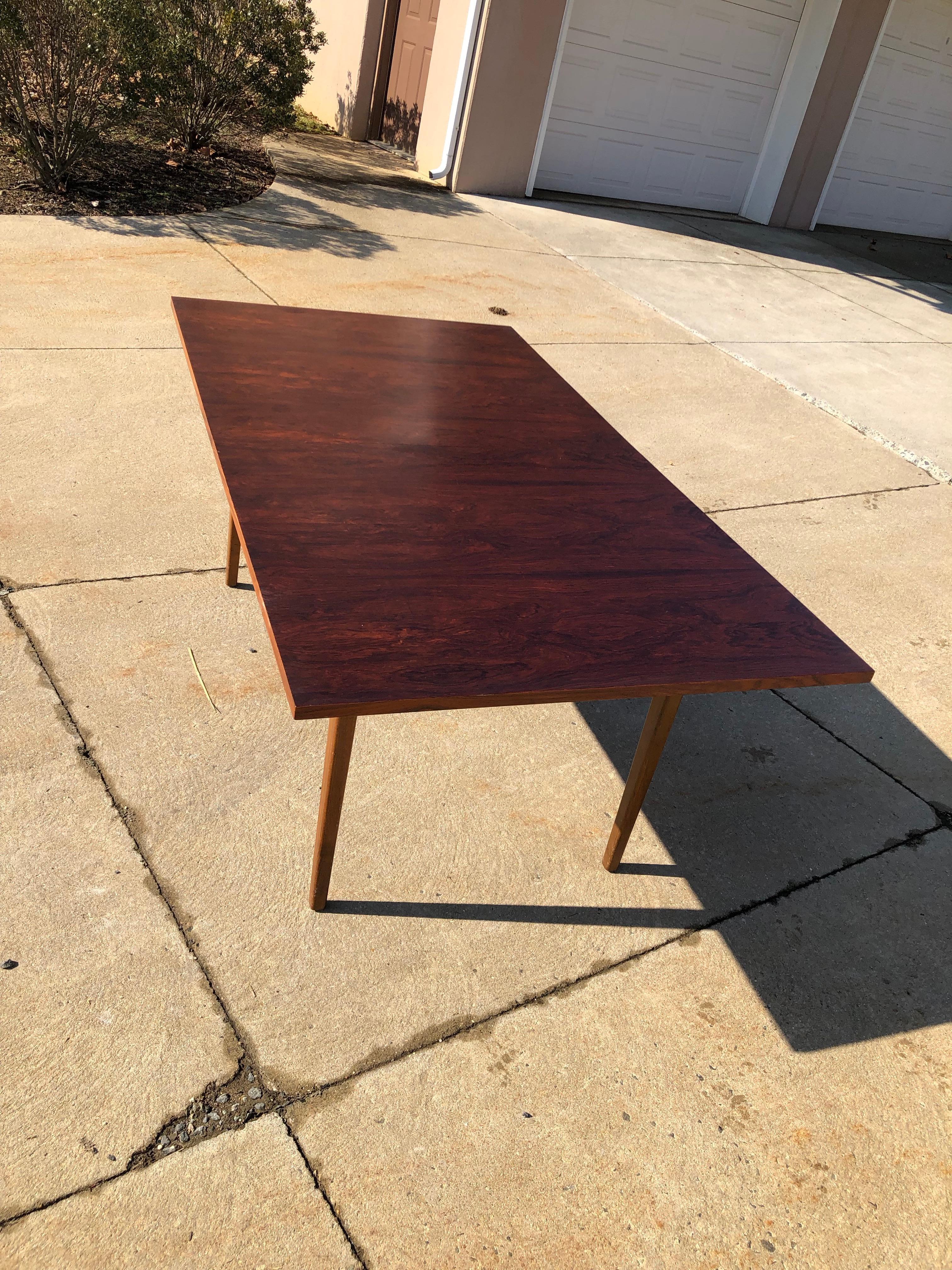 Edward Wormley for Dunbar Brazilian rosewood dining table. Table is 72 inches long and has two 12 inch leaves thus expanding up to 98 inches. All original.