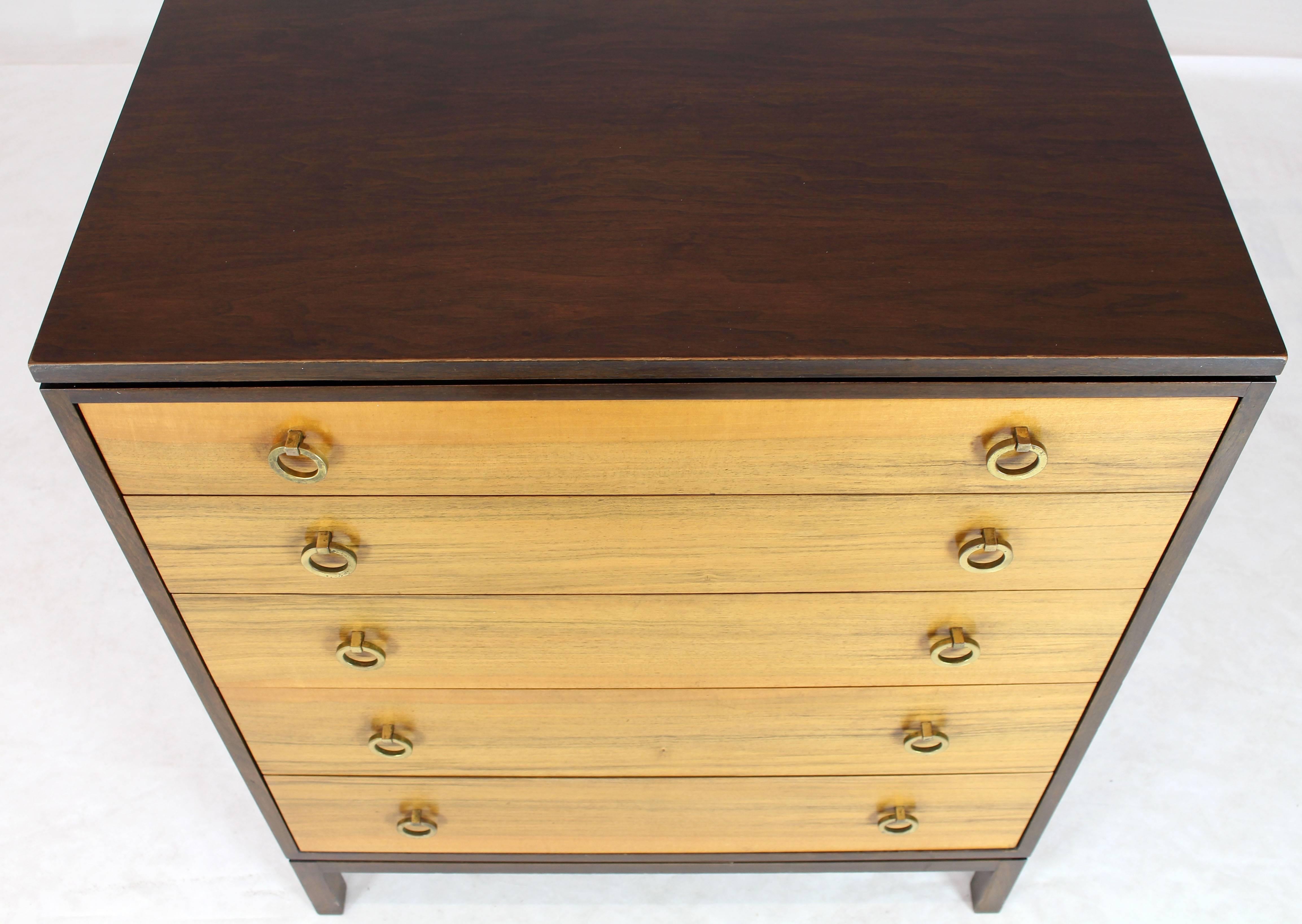 Mid-Century Modern five drawer Dunbar chest by Ed Wormley. Rosewood mahogany two-tone combination. Brass ring drop pulls.
 