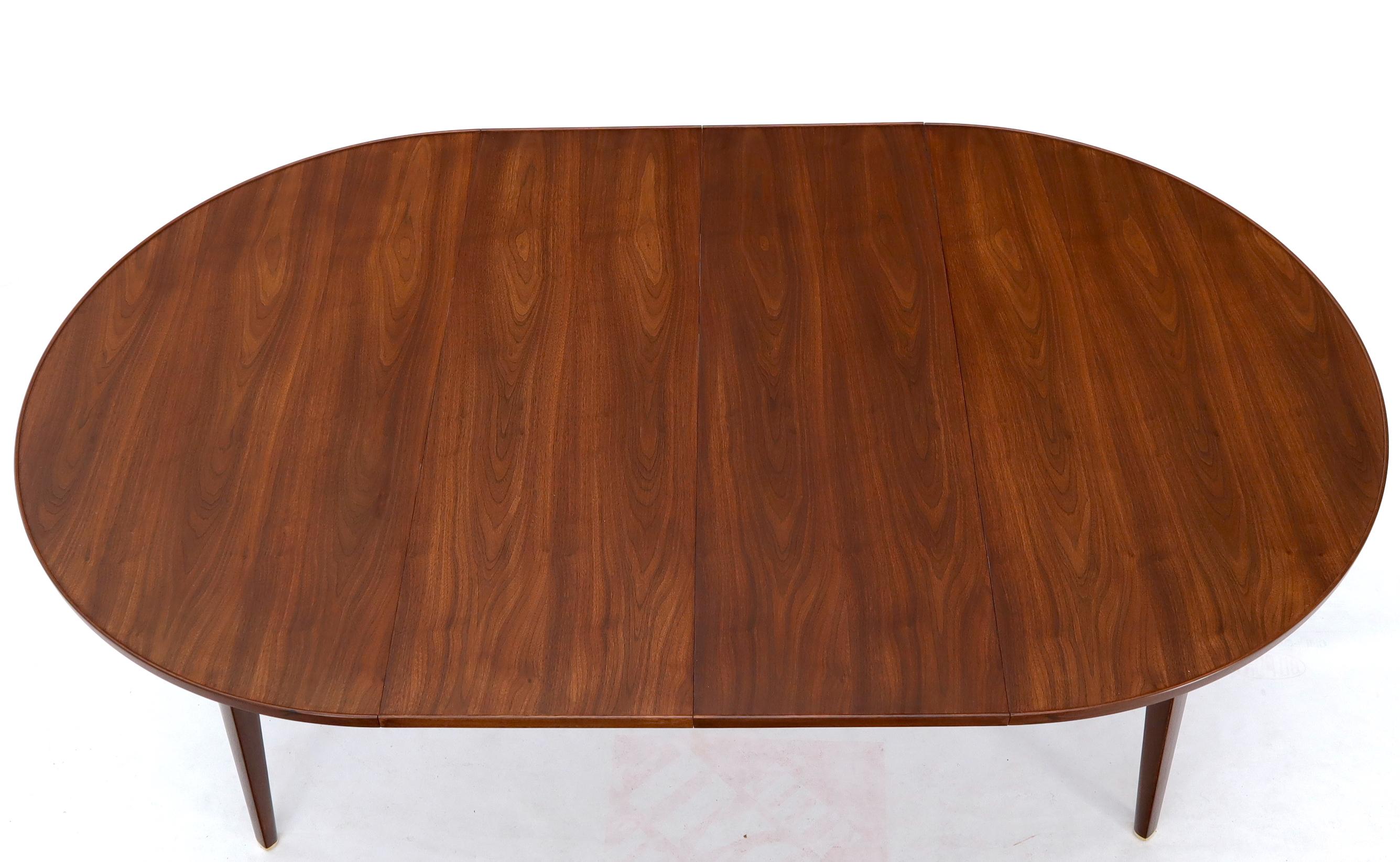 20th Century Dunbar Round Walnut Dining Table with 2 Extension Boards Leafs Racetrack Shape For Sale