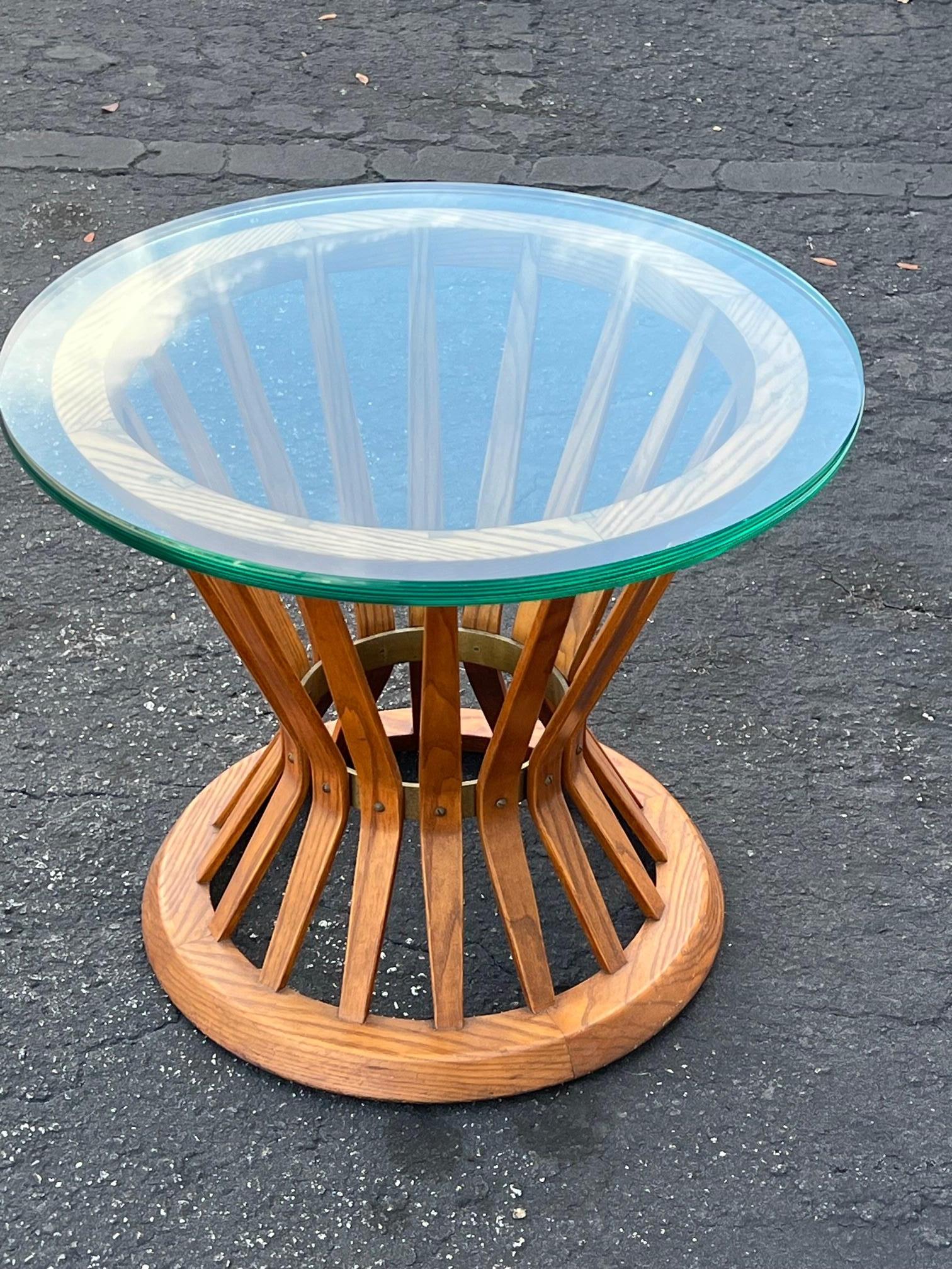 A classic Edward Wormley for Dunbar sheaf of wheat side table. Original 1950’s label. Comes with 3/4” thick 24”glass. Could be used with stone or different piece of glass. 