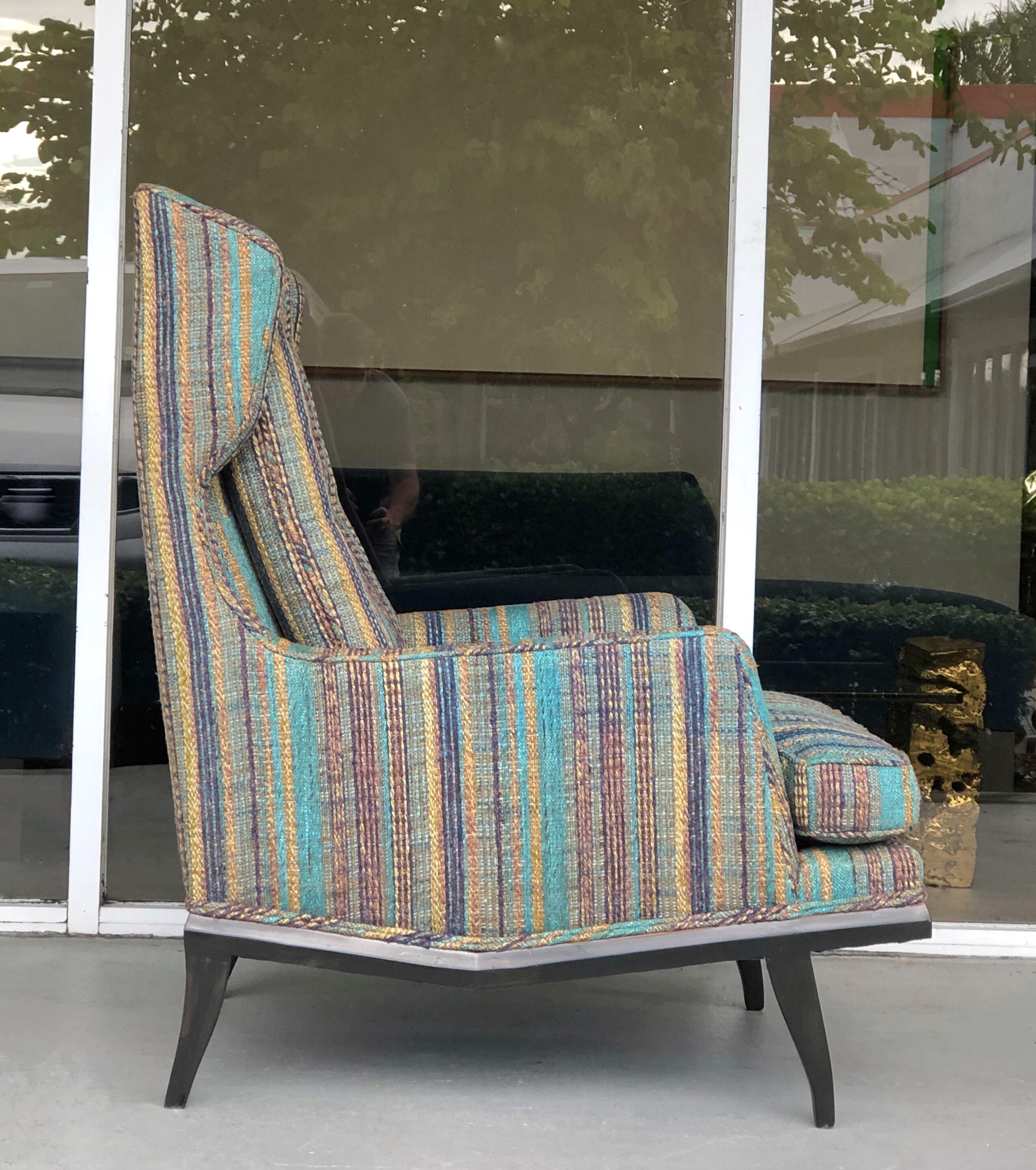 Mid century lounge chair. Retains original silk boucle upholstery in very good condition.