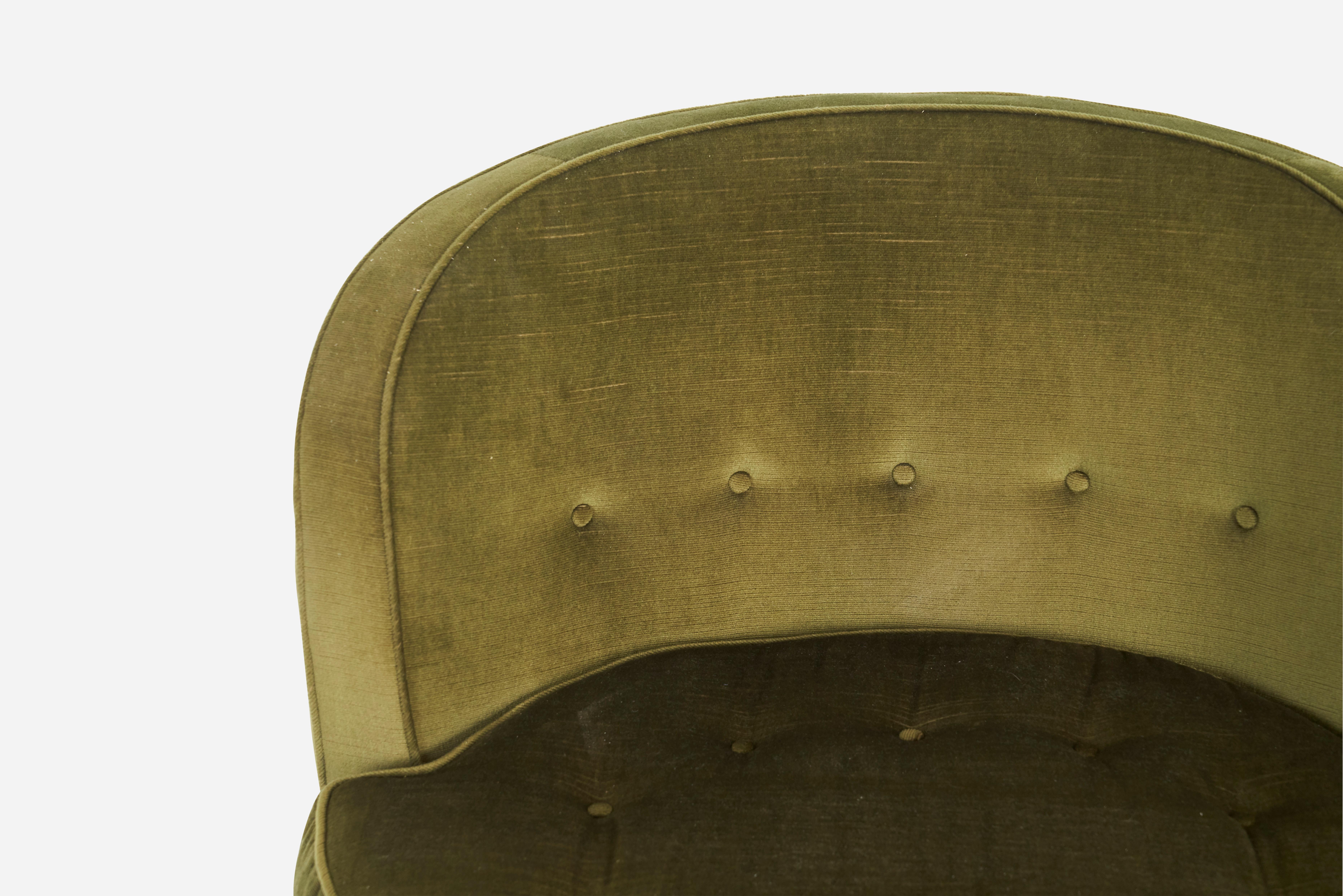 Swivel chair designed by Edward Wormley for Dunbar. Walnut swivel base with original fabric.