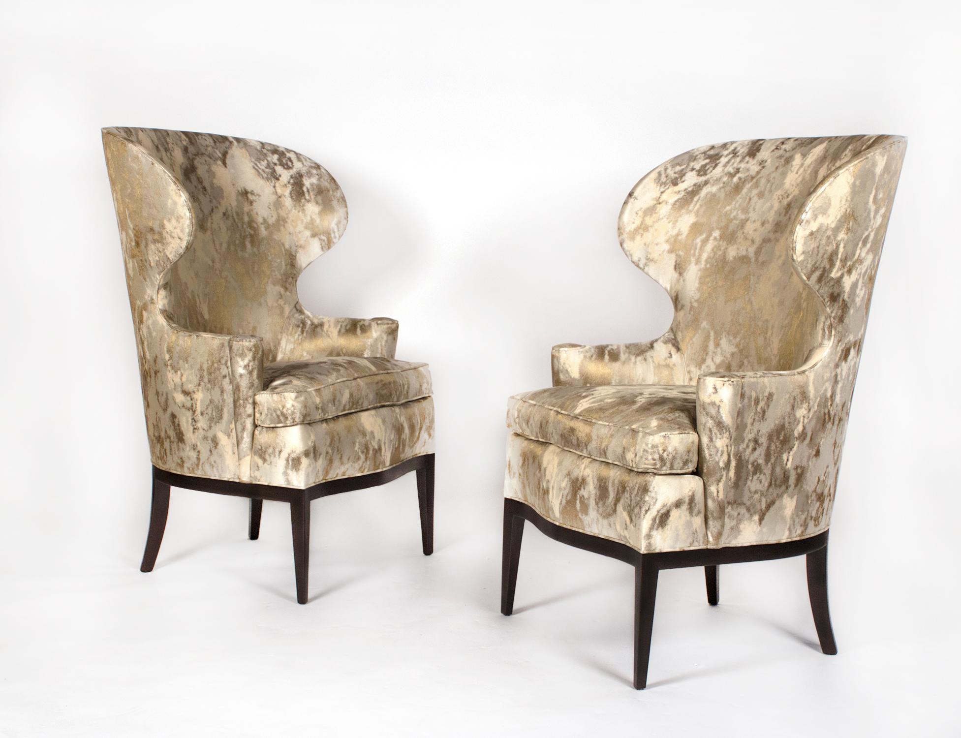 Pair of early and important wing back chairs designed by Edward Wormley for Dunbar. Professionally restored with new foam, new springs, down-filled seat cushions and upholstered in a custom-made textile produced exclusively for Cartier. The
