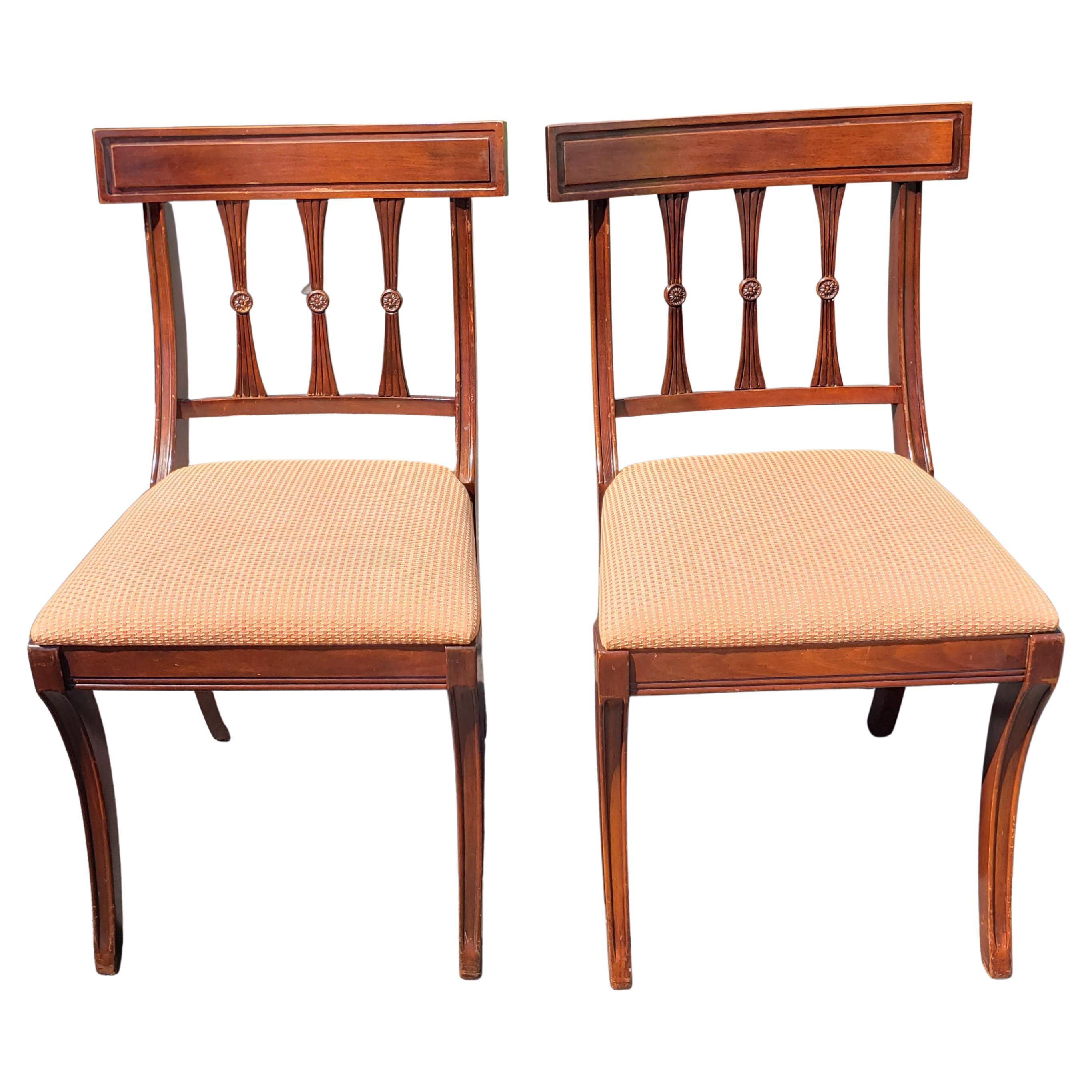 Beautiful pair of Duncan Phyfe Mahogany upholstered chairs Circa 1940s.
Good vintage condition. Where reupholstered. Please last 2 pictures for more close upholstery color.
Measure 17.5