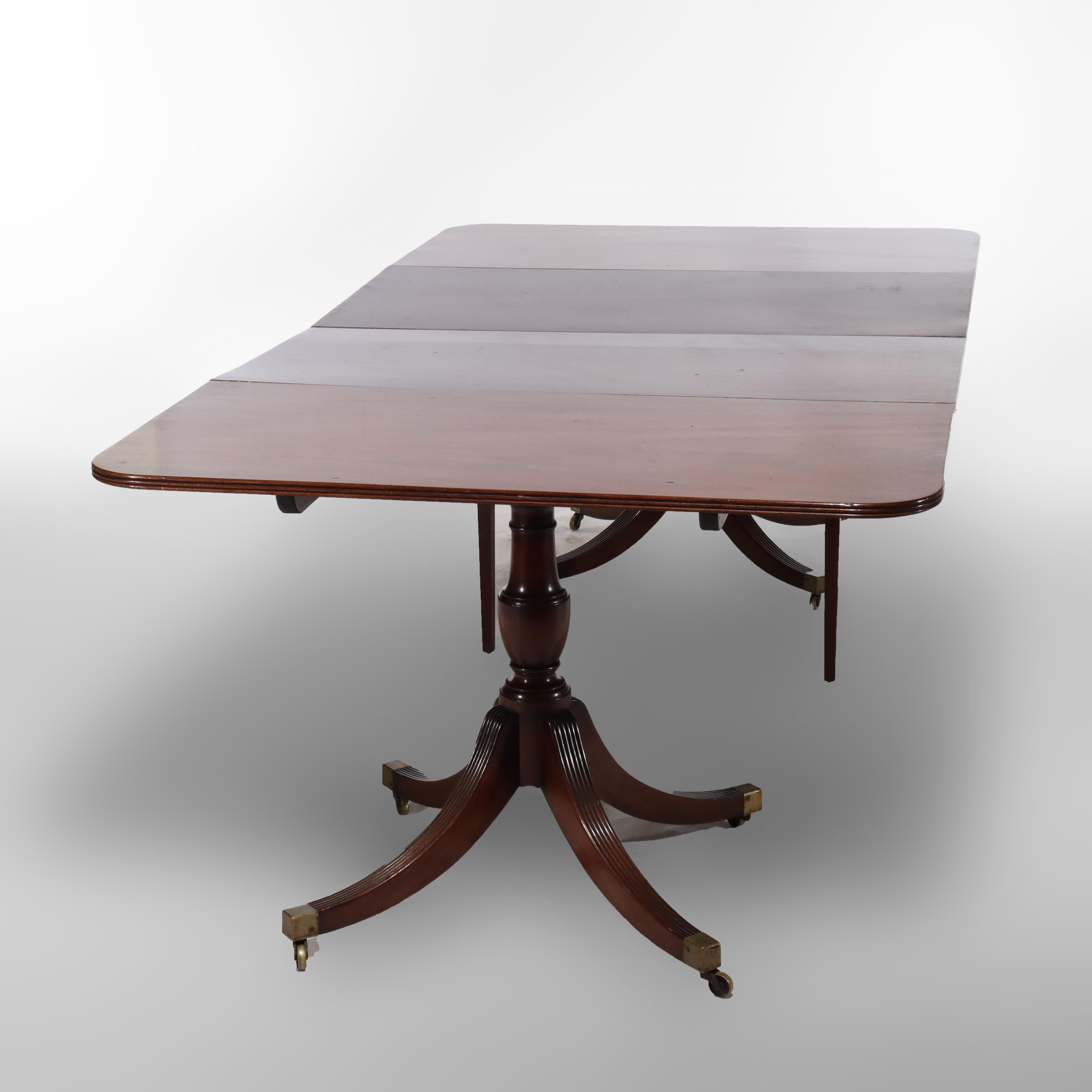 Table de banquet en acajou de style George III de Duncan & Phyfe avec trois abattants c1820 en vente 7