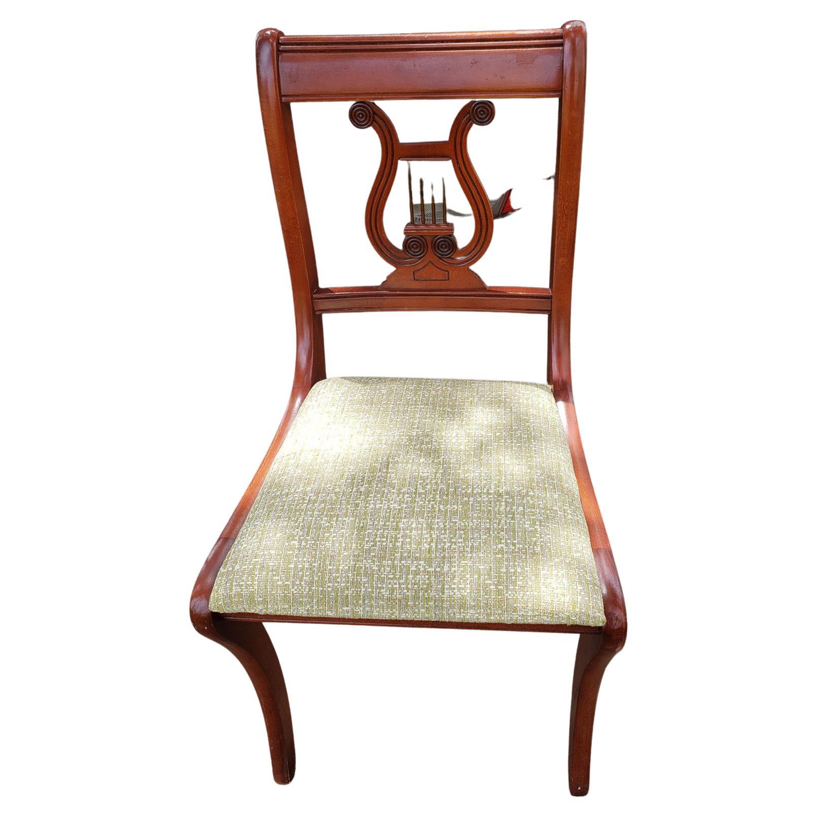 Pair of Lyre back Side Chair or Harp Back chair.
Both Excellent us chairs are in excellent condition.
Made out of wood. Upholstery on both chairs is in great condition.
Elegant and sturdy as well. Constructed after the designs made famous by