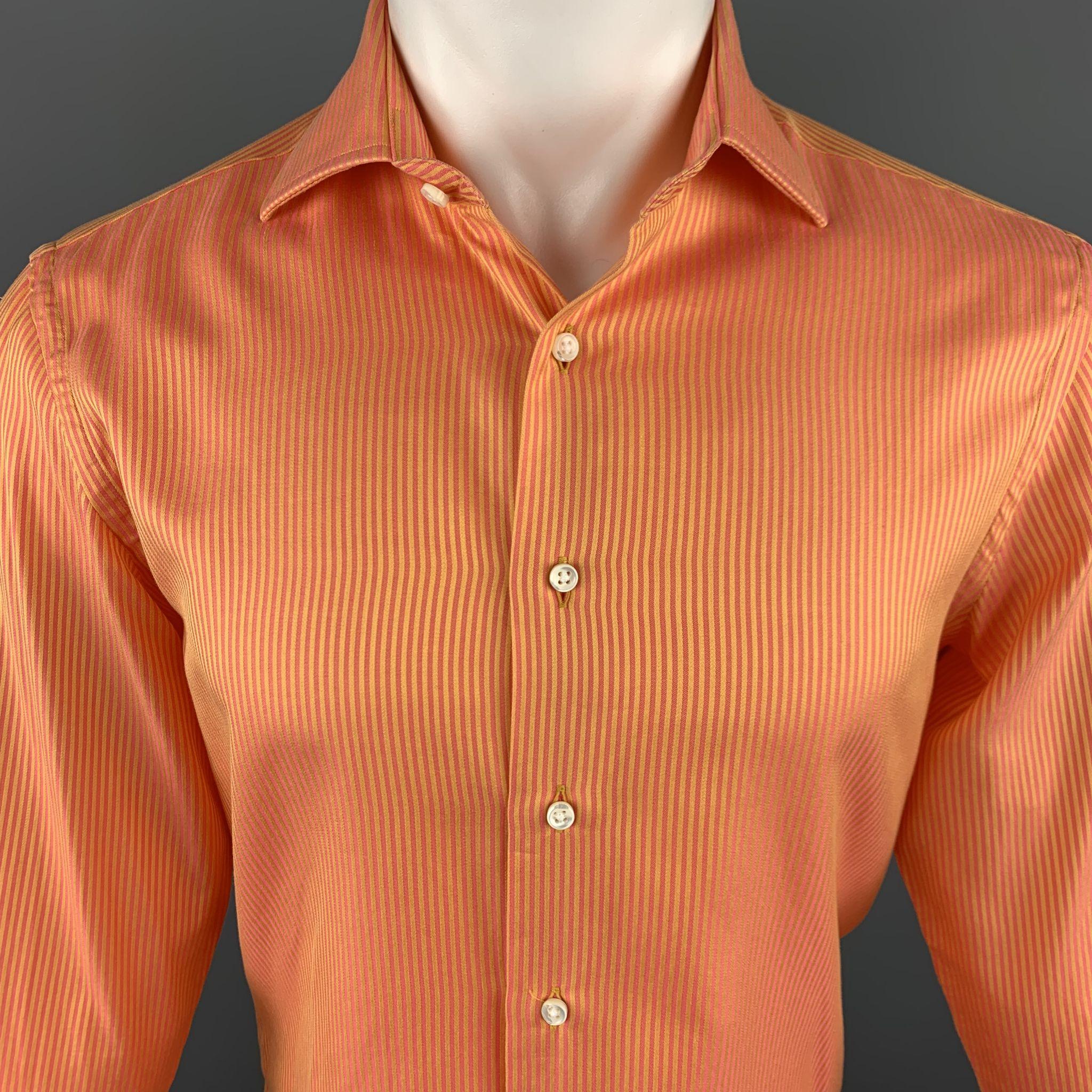 DUNCAN QUINN Long Sleeve Shirt comes in orange tones in a striped cotton material, with a spread collar, buttoned cuffs, button up. Made in Italy.
 
Excellent Pre-Owned Condition.
Marked: S
 
Measurements:
Shoulder: 16 in.
Chest: 41 in.
Sleeve: 26