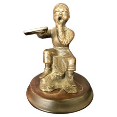 Dunce Cigar Tip Cutter, Bronze Sculpture