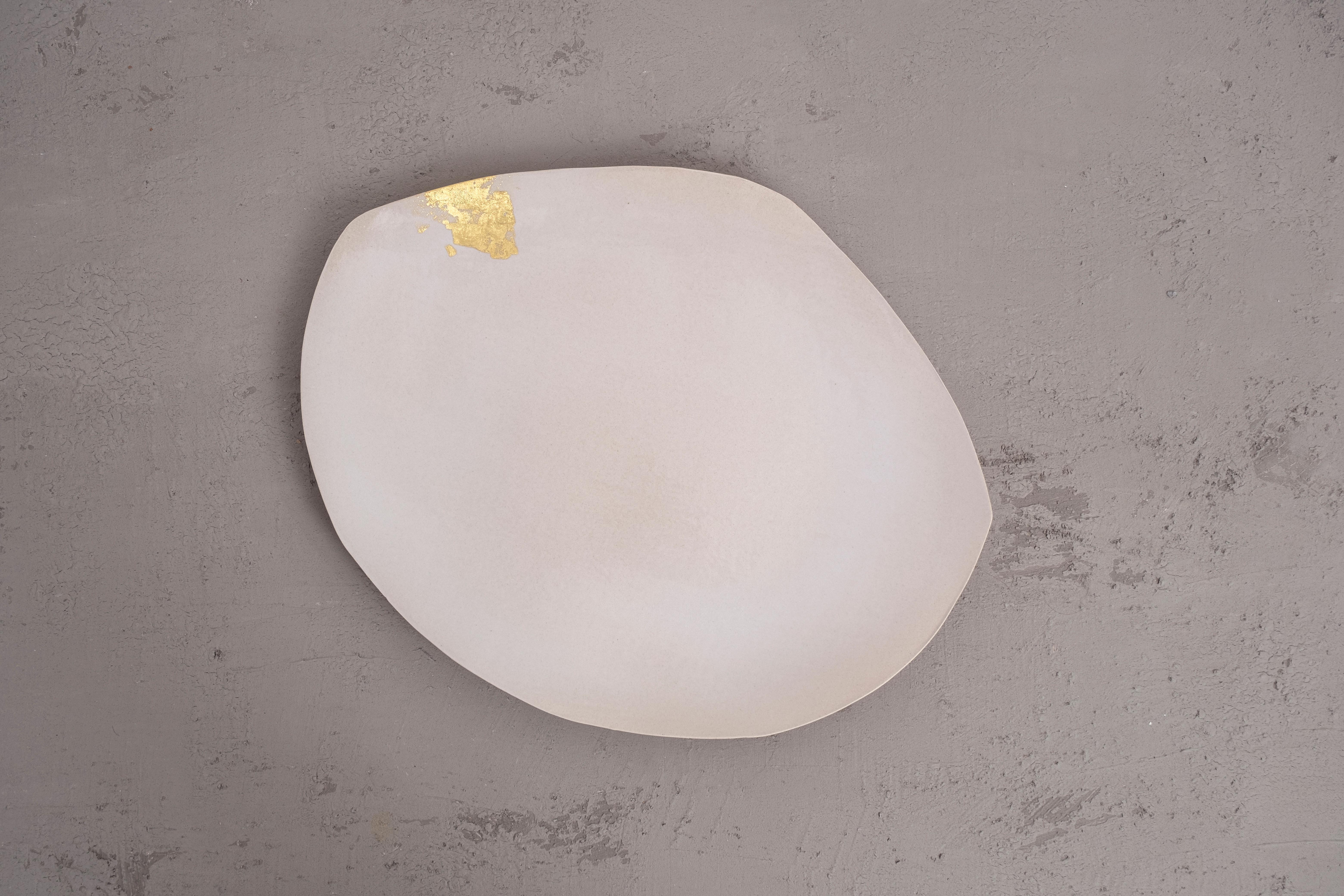 Dune #10 sculpture by Margaux Leycuras
One of a Kind, Signed and numbered
Dimensions: D 40 x H 50 cm.
Material: Sandy stoneware platter with white glaze and 22 Carat gold leaf.

The piece is signed, numbered and delivered with a certificate of