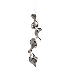 Lampada a sospensione 'Dune 4 Vertical Line' in alluminio lucidato argento per Moss Objects
