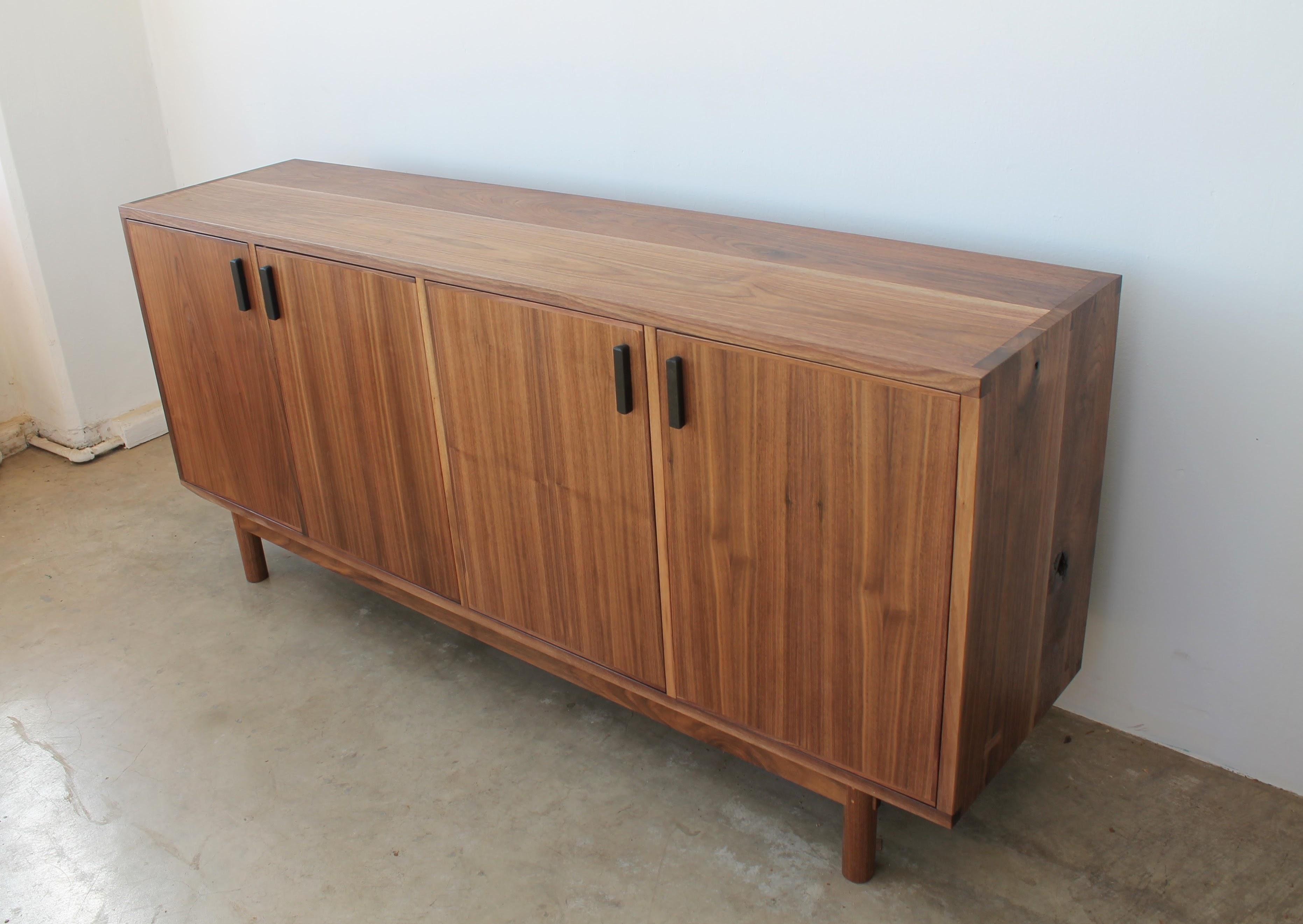 The Dune Allen credenza is crafted to handle all your storage needs with refined simplicity. Clean lines and strong joinery amount to a piece that is sturdy, yet elegant. The carcass is built from 1 1/4