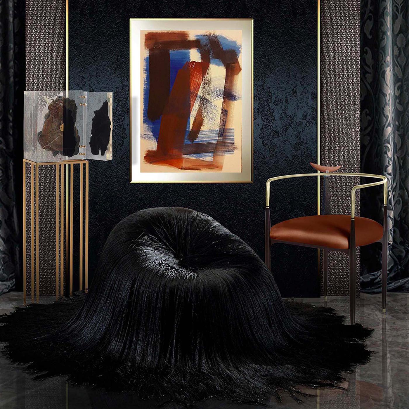 Designed by Livio Ballabio, this chair exudes modern sophistication and can be showcased anywhere in the house. Its light silhouette features soft vertical lines in wenge that form the legs, armrests and backrest. Enriched with details in brass,