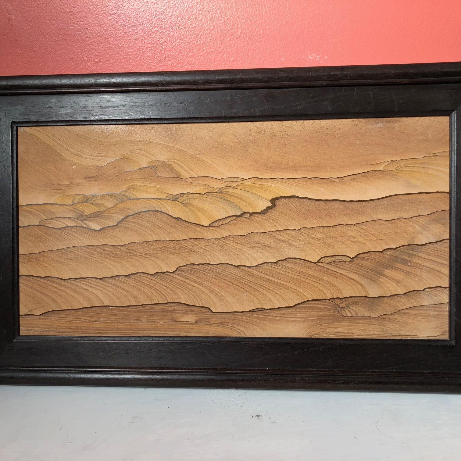 Extraordinary Natural work, one of a kind.

This Chinese extraordinary natural stone painting of a minimalist depiction of what appear to be sand dunes in natural sand and light colors. This is called a dream stone Shih-hua. They are cut from