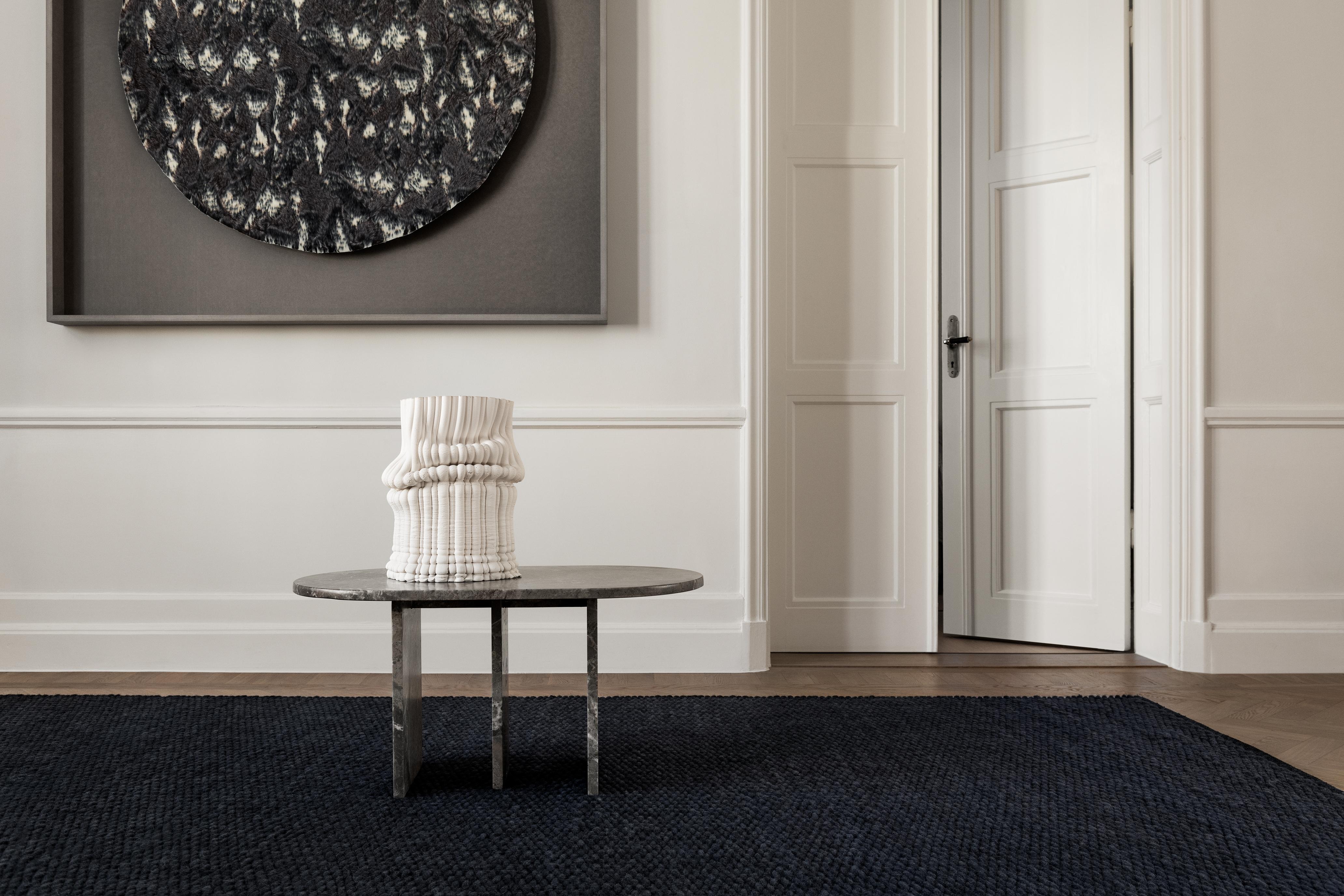 The Dunes collection is all about the beauty of its texture. Woven using a heavy yarn to create a thick luxurious feeling rug. This very dark blue color is inspired by the almost black nordic winter night sky

100% quality wool for softness and
