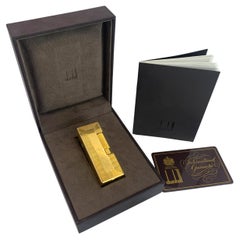 Dunhill Encendedor de Bolsillo Rollagas Chapado en Oro de 18 ct Con Caja Original.