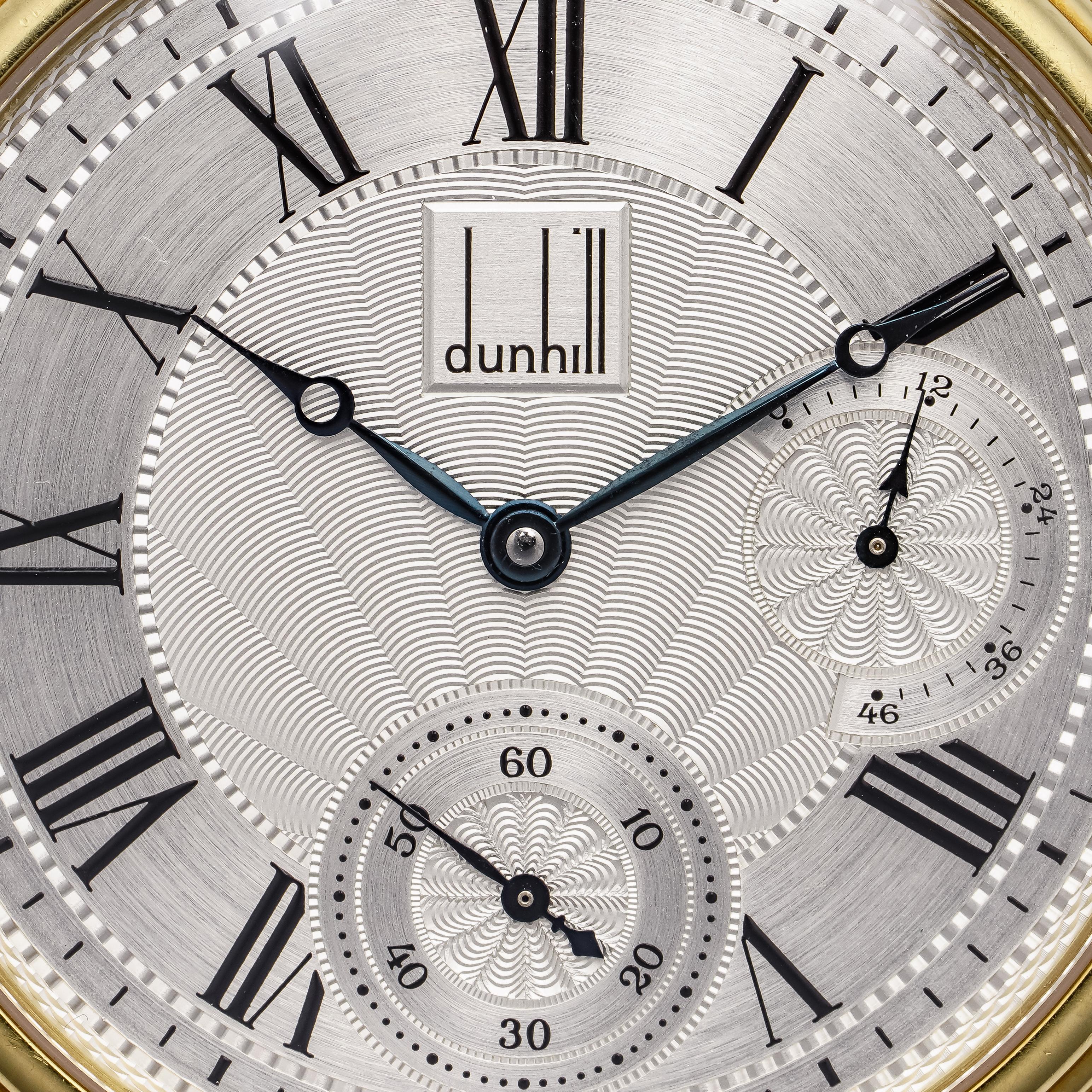 Dunhill 18kt. yellow gold Centenary Pocket Watch
Limited Edition: 15/25
Made in Switzerland, Circa 2000
Movement: Mechanical hand winding
Case diameter: 51 mm
Watch Case Material: 18kt. yellow gold
Dial colour: Silver
Roman numeral hour