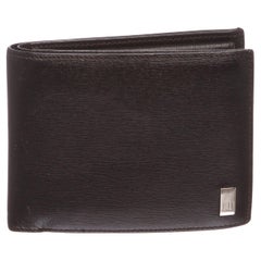 Dunhill black leather bi fold wallet. silver-tone hardware, inner four card