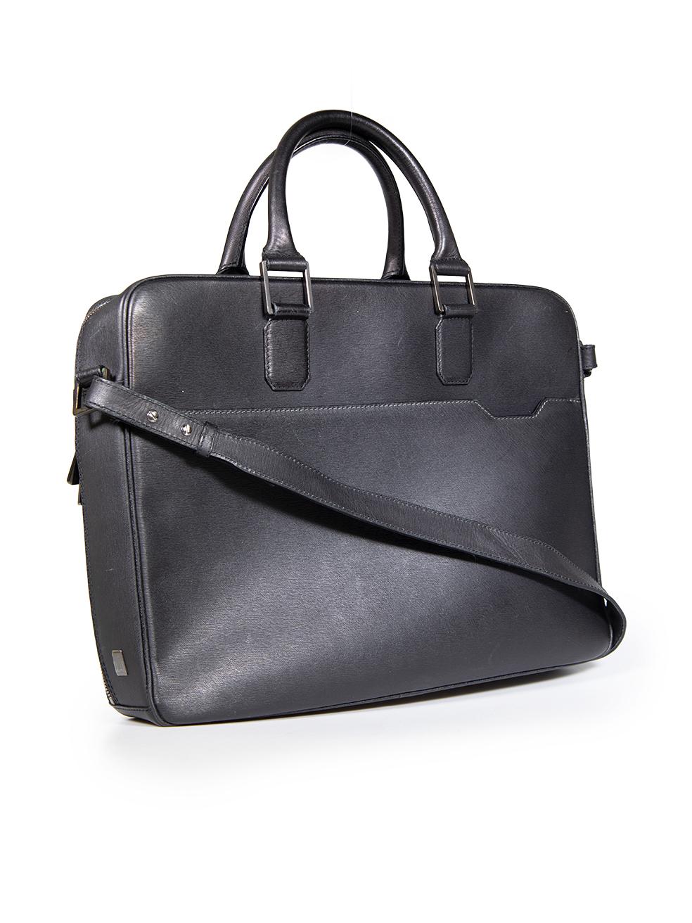 CONDITION is Very good. Minimal wear to the bag is evident, there are abrasions on the bottom base corners and on the edges of the shoulder strap. There is a scratches on the hardware stoppers at the bottom of the bag and on the front of this used