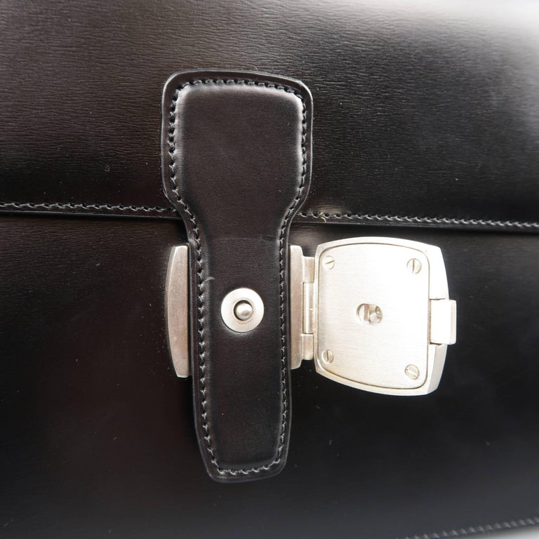 DUNHILL Black Leather Silver Lock Wristlet Clutch at 1stDibs