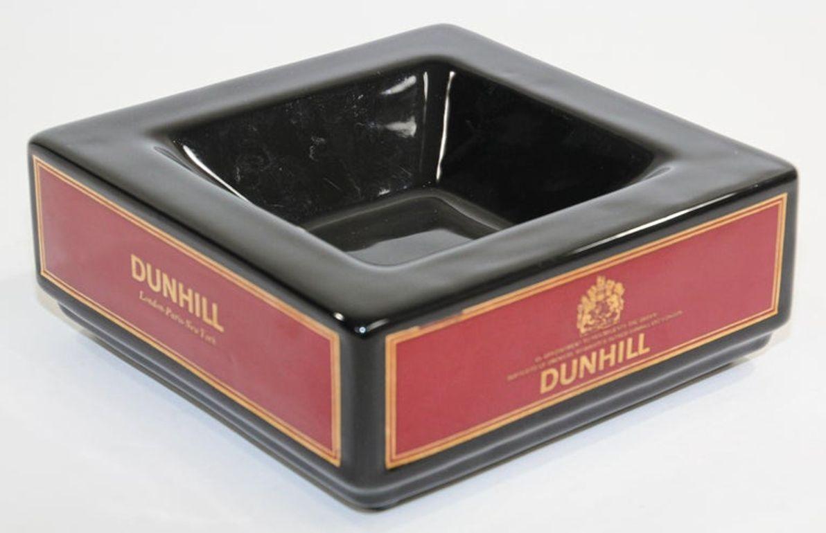 Large Vintage Dunhill ceramic square collectible ashtray catchall by Wade England Royal red and black.
Vintage Alfred Dunhill collectible porcelain cigar ashtray by Wade, England.
Material: Glazed prestige porcelain with gold lettering on red