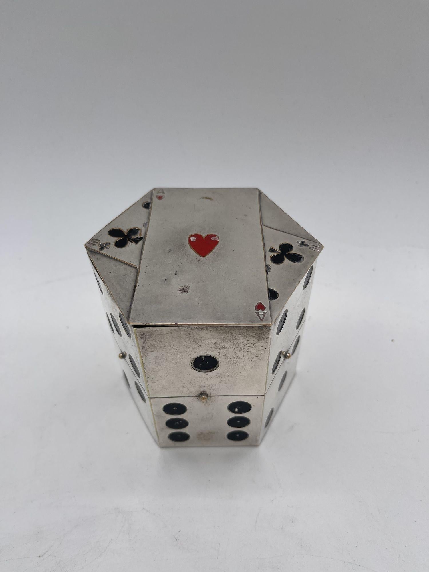 Very limited Jeweler-made Cigarette Dispenser hallmarked by the silversmith Legros Marius for Dunhill that resembles a stacked pair of dice with playing cards on top. A simple press of the center button seamlessly hidden in the center dot of the