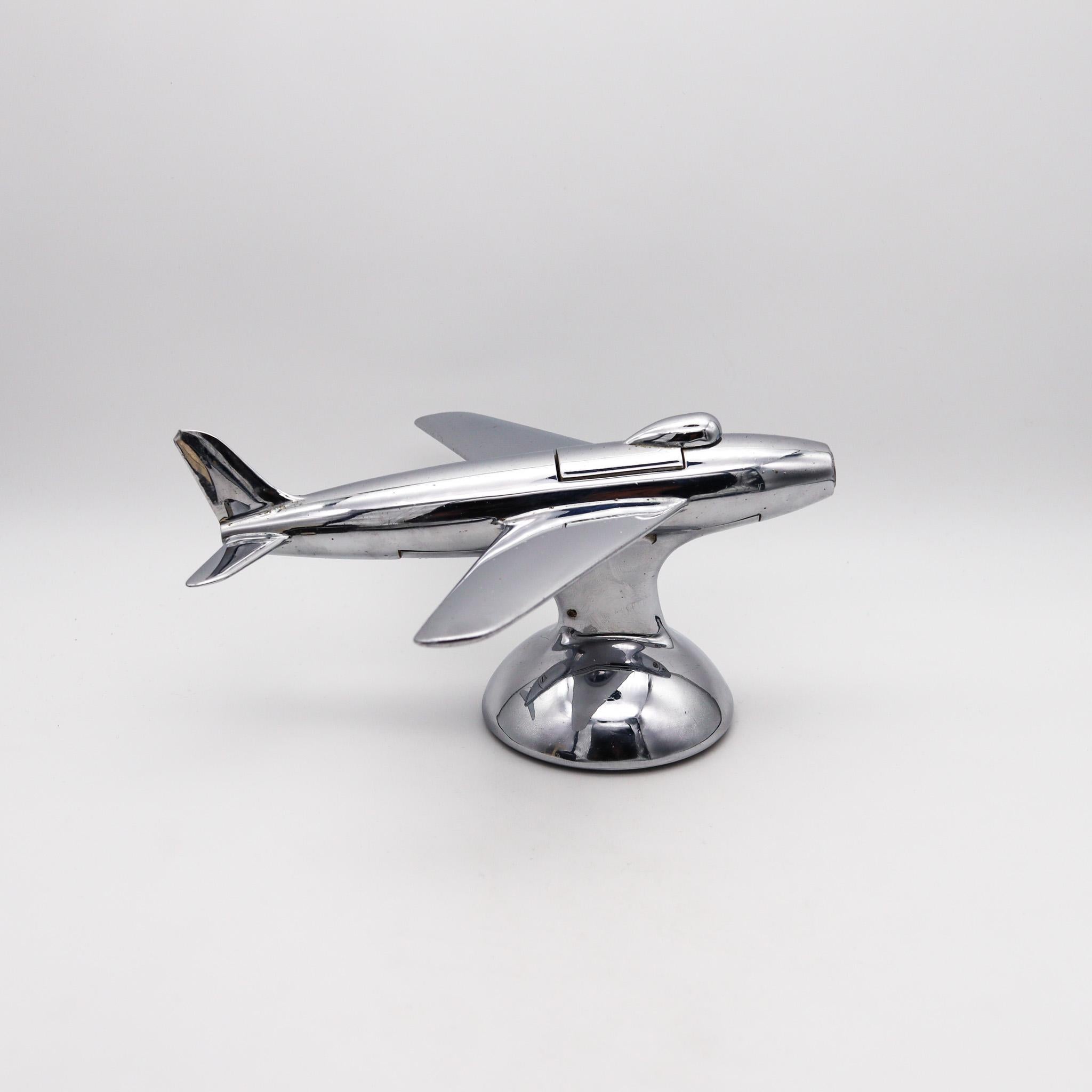 F-86 Jet fighter aircraft table lighter designed by Alfred Dunhill.

An unusual table desk lighter made in London England by the renowned Alfred Dunhill Company, between 1954 and 1961. The lighter was done in polished chromed steel, during the