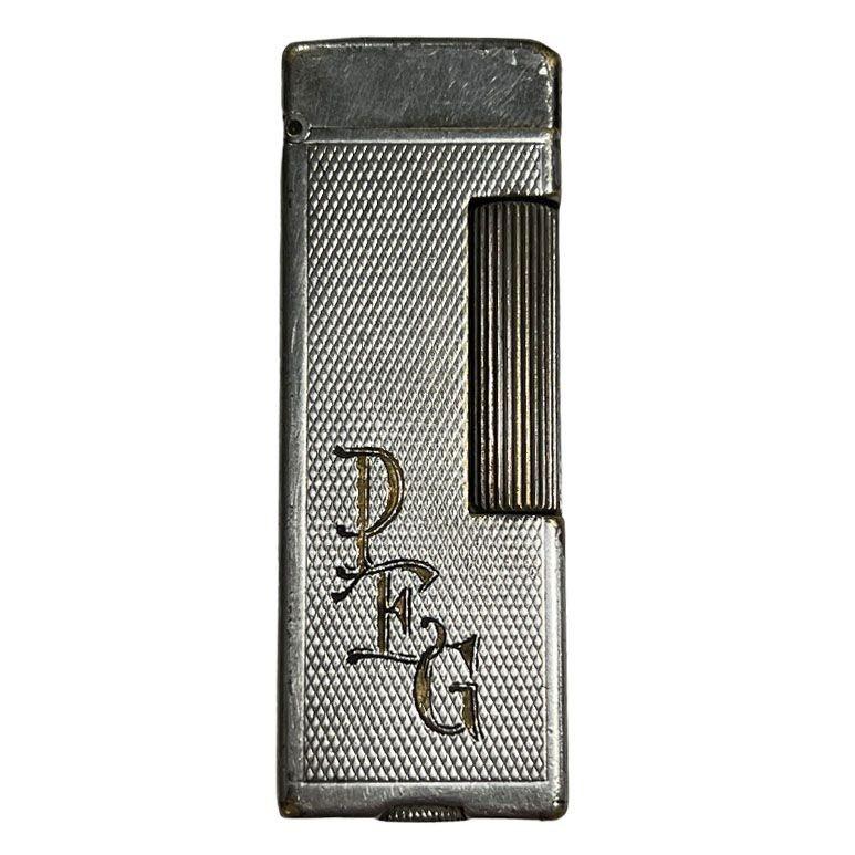 Dunhill London Silver Rollagas Lighter: This wonderful vintage Silver plate Alfred Dunhill Lighter is called a Rollagas inscribed with the initials 