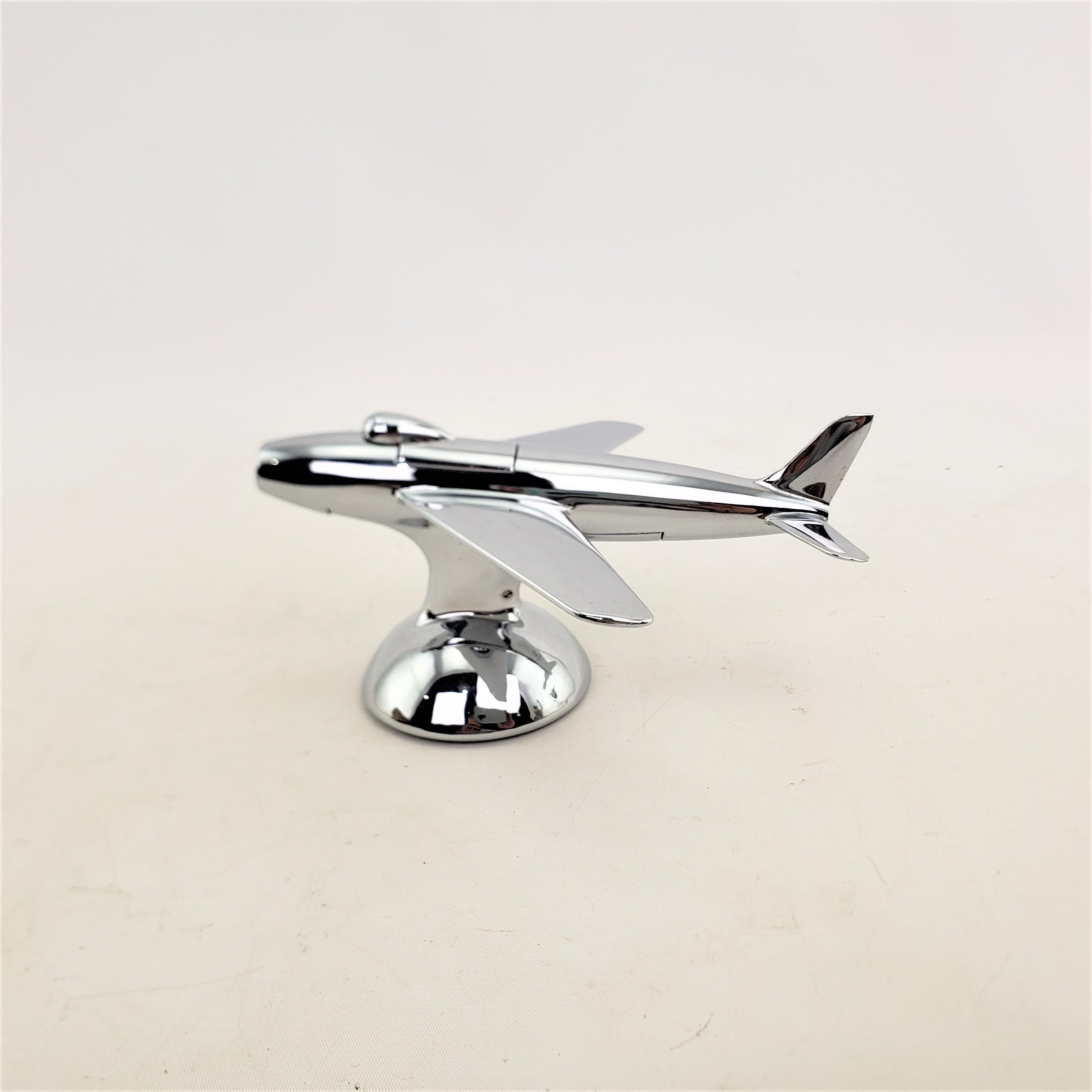 English Dunhill Mid-Century Modern Chrome Stylized Sabre Jet Airplane Table Lighter For Sale