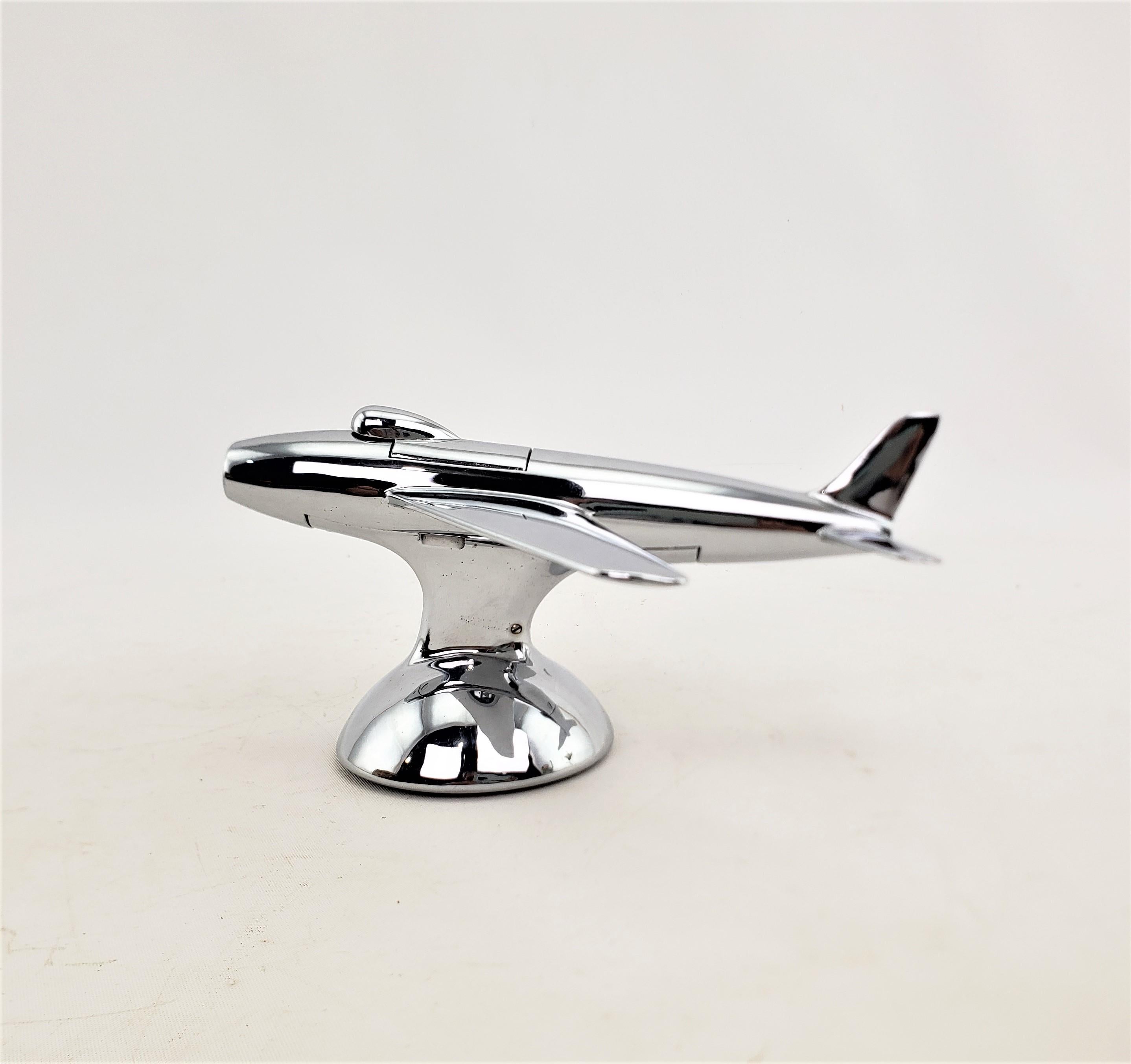 Machine-Made Dunhill Mid-Century Modern Chrome Stylized Sabre Jet Airplane Table Lighter For Sale
