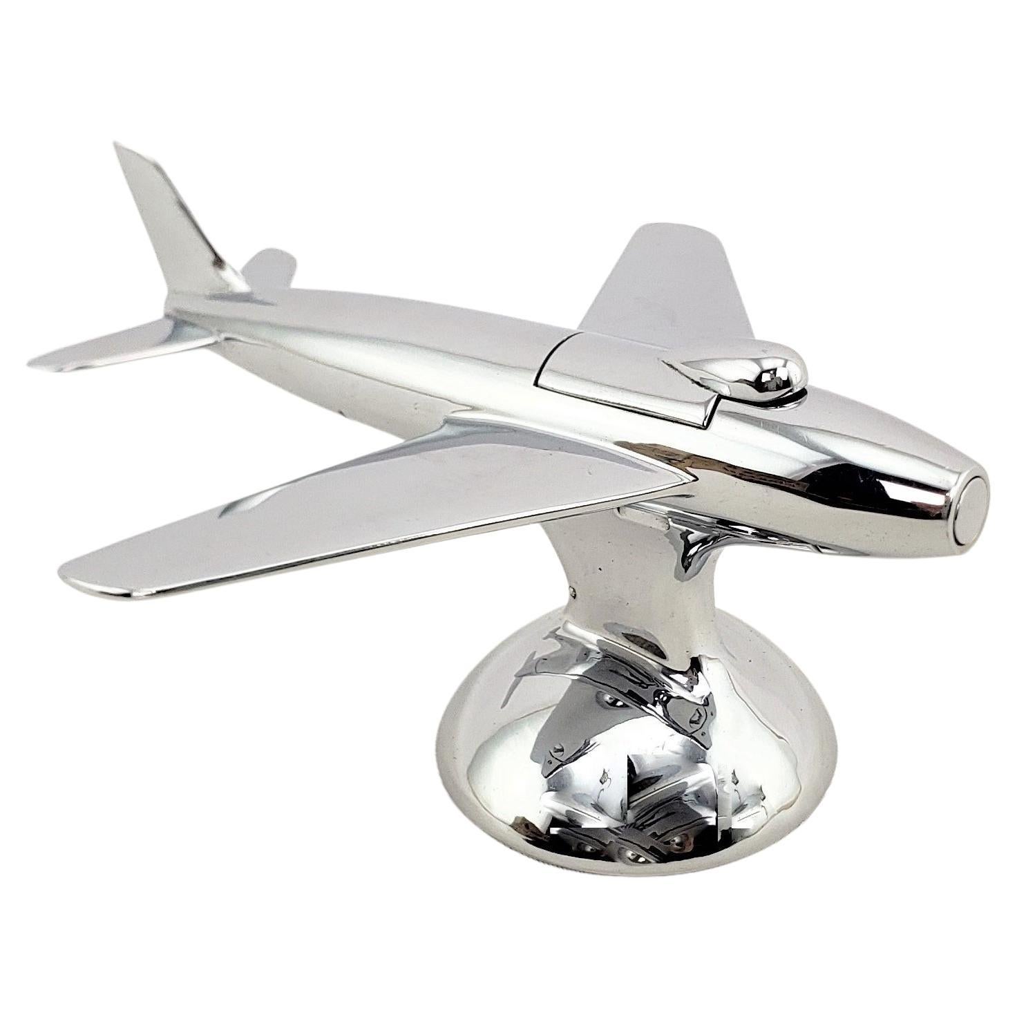 Dunhill Mid-Century Modern Chrome Stylized Sabre Jet Airplane Table Lighter For Sale