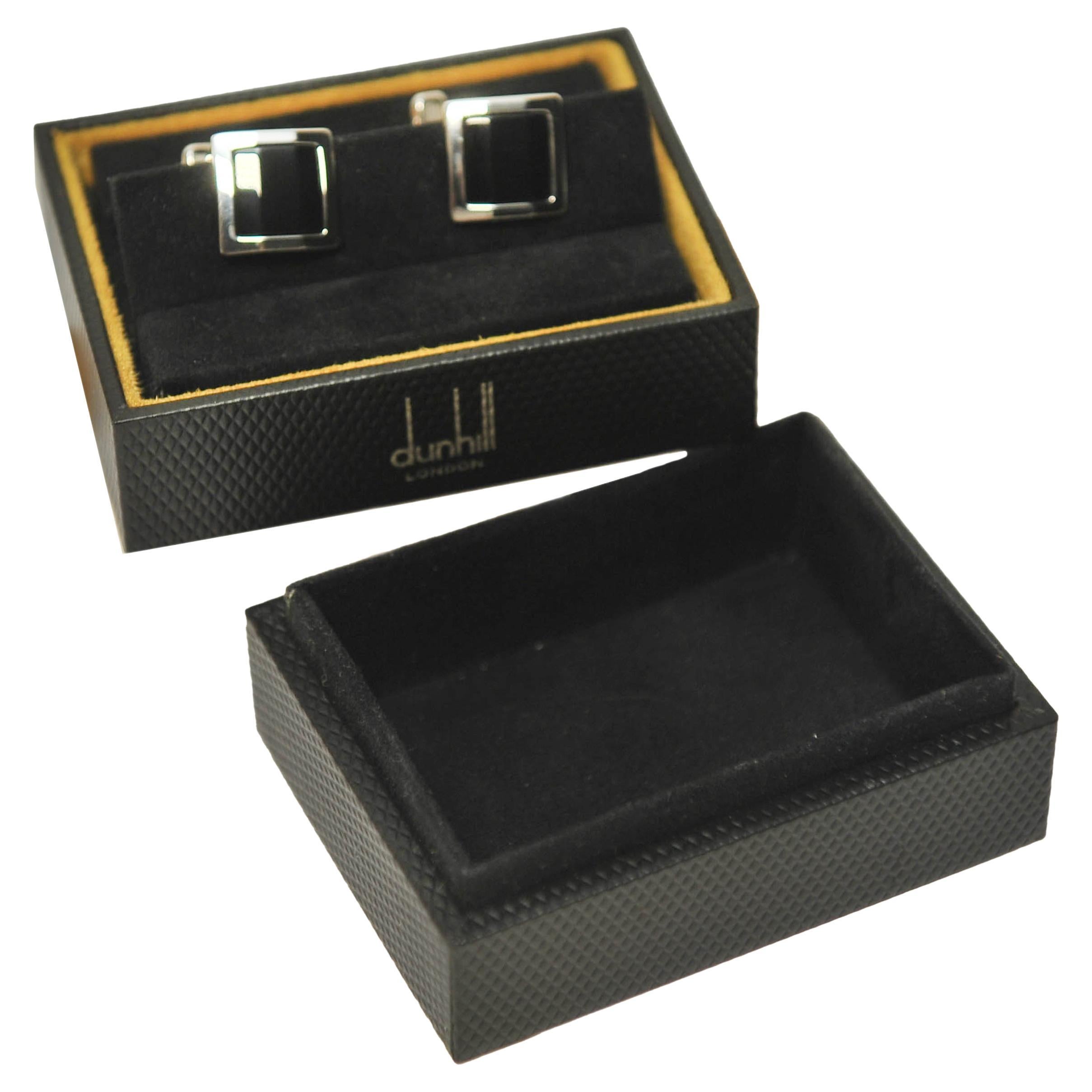 Dunhill of London Sterling Silver & Onyx Cufflinks in Original Dunhill Presentation Box & Card

Engraved logo on the swivel fastening.

99% Silver, 1% Rhodium plated
Made in Germany
