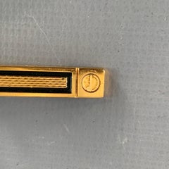 Dunhill Clip de cravate en métal embossé noir et or, taille unique