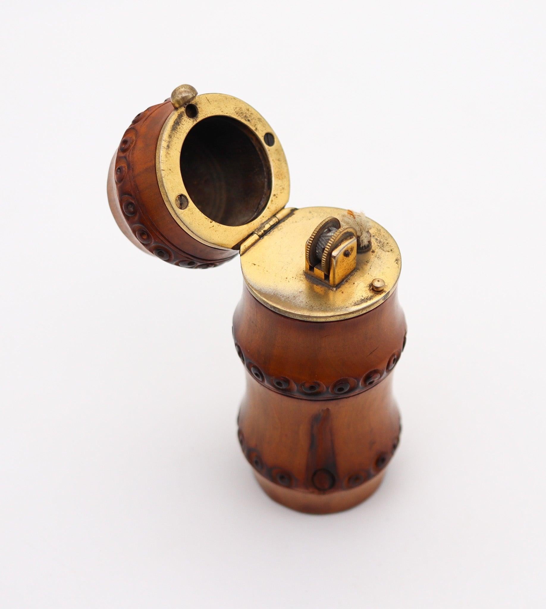 Bamboo desk lighter designed by Alfred Dunhill

This is a rare antique desk lighter, created in Paris France by the luxury brand of Alfred Dunhill, back in the 1934. The unusual art deco lighter was crafted with carvings of bamboo and parts in 18
