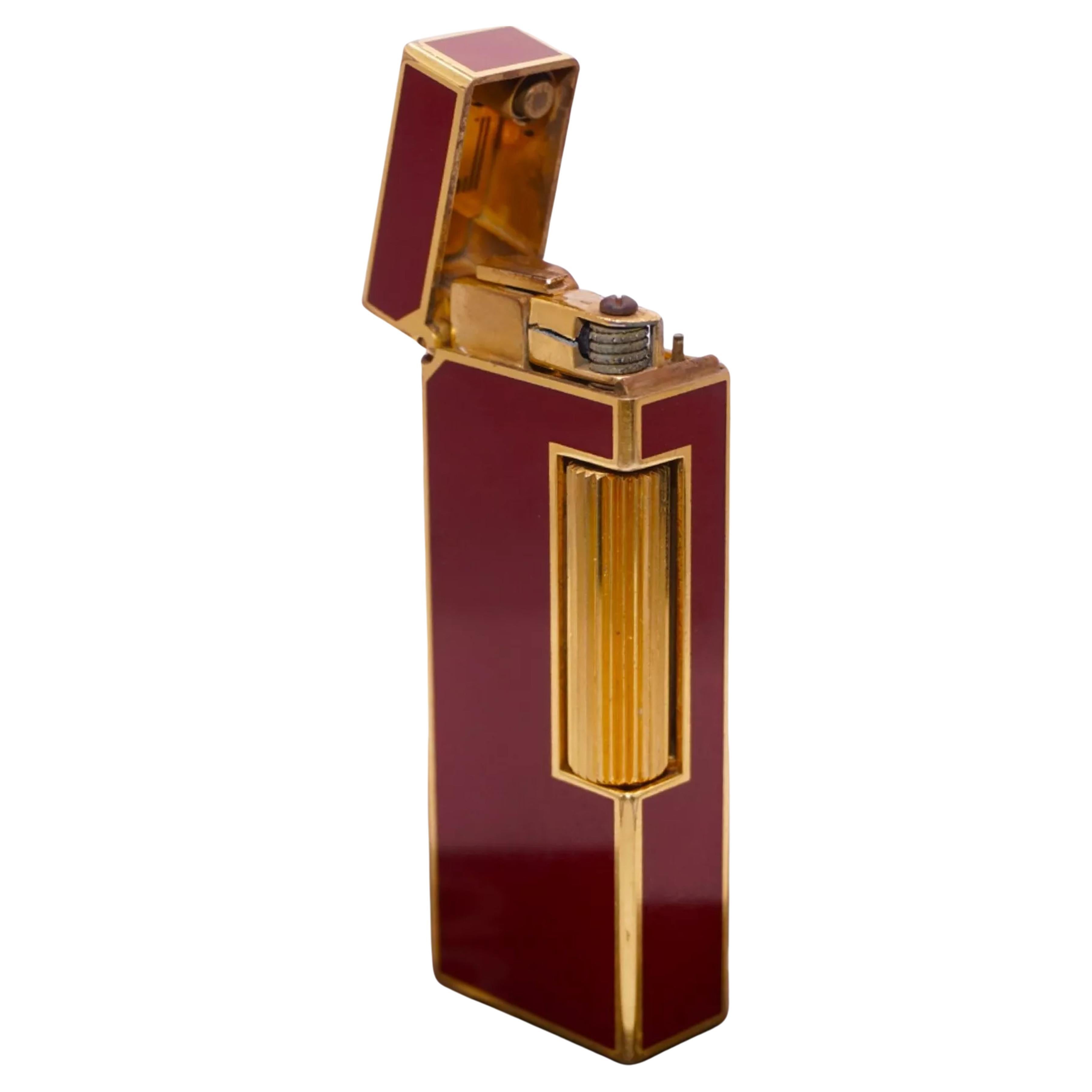 Dunhill Red Lacquered Goldplated Rollagas Classic Cigarette Lighter Made in Switzerland With Navy Blue Dunhill Embossed Box

Inscribed with 