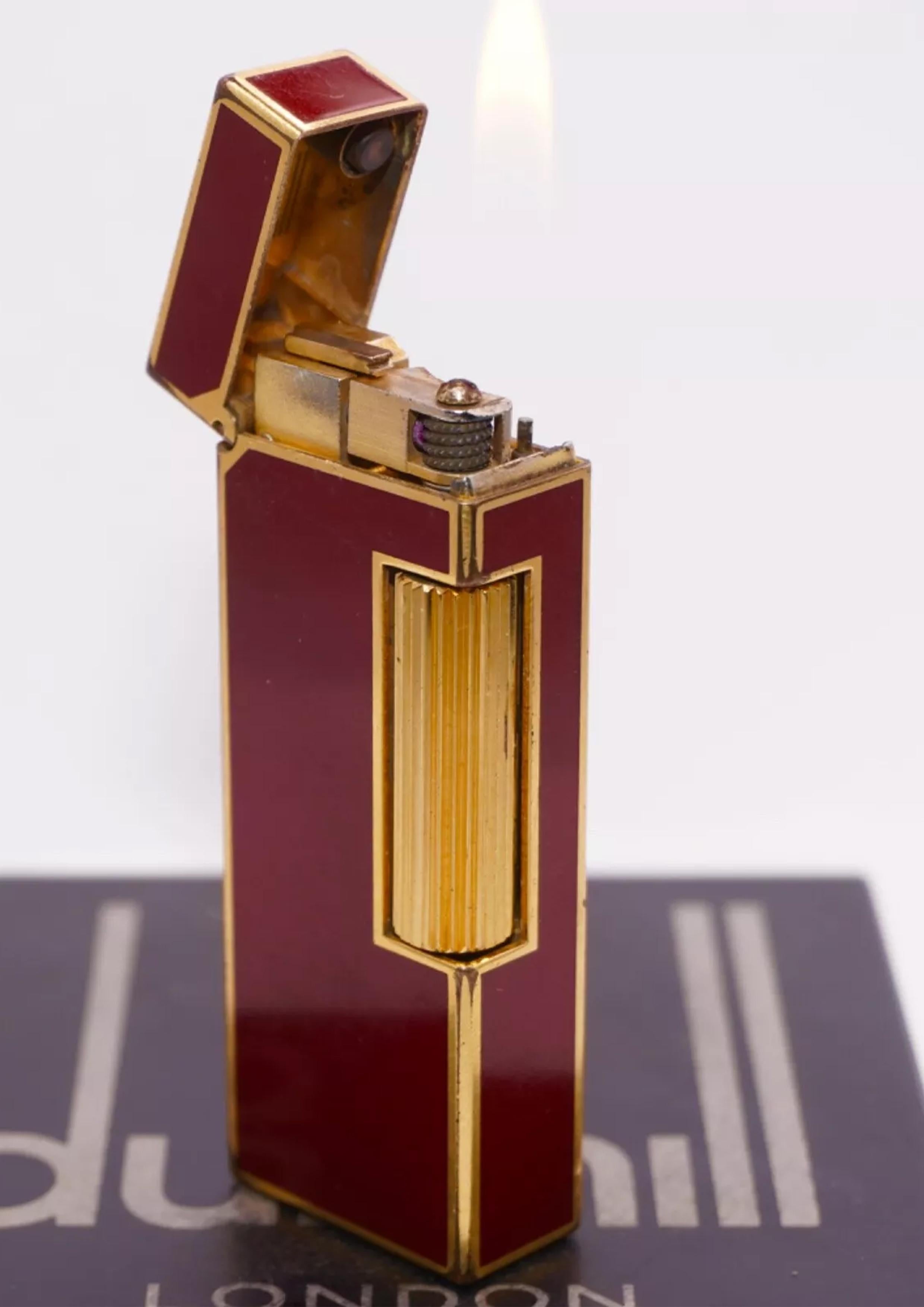 Elegant Dunhill Red Lacquered 18 Carat Gold Plated Rollagas Classic Cigarette Lighter Made in Switzerland With Dunhill Embossed Box

Inscribed with 