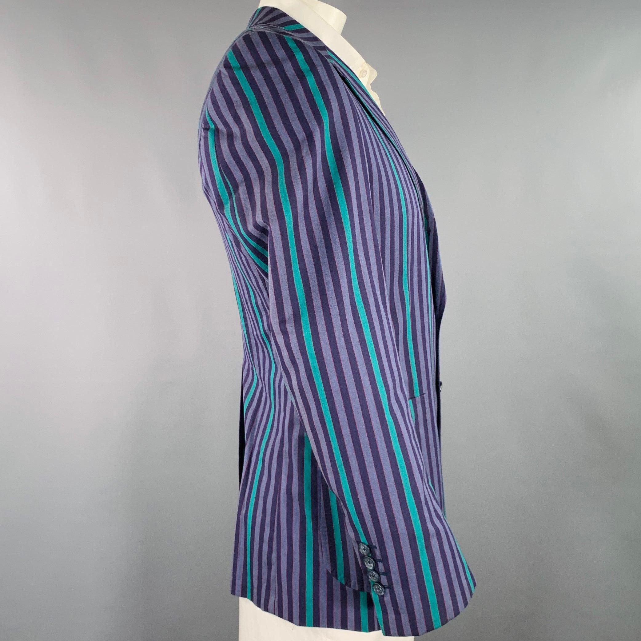 DUNHILL sport coat
in a purple and green cotton woven fabric featuring a stripe pattern, notch lapel, single vented back, and double button closure. Made in Italy.Excellent Pre-Owned Condition. 

Marked:   IT 52 

Measurements: 
 
Shoulder: 18