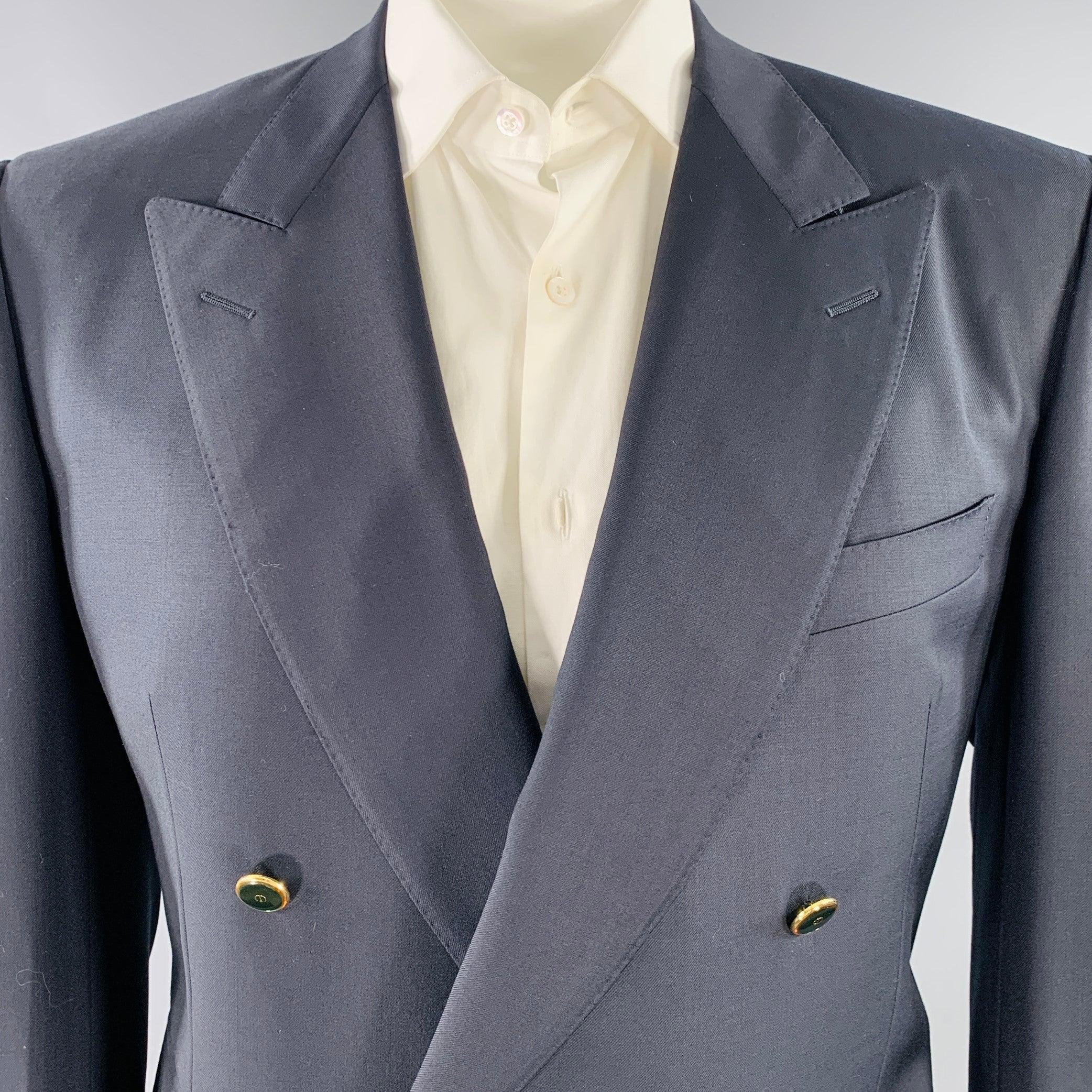 DUNHILL sport coat
in a navy wool featuring a double breasted style, peak lapel, double vented back, and double button closure with gold tone metal monogram buttons.Excellent Pre-Owned Condition. 

Marked:   IT 54 

Measurements: 
 
Shoulder: 19