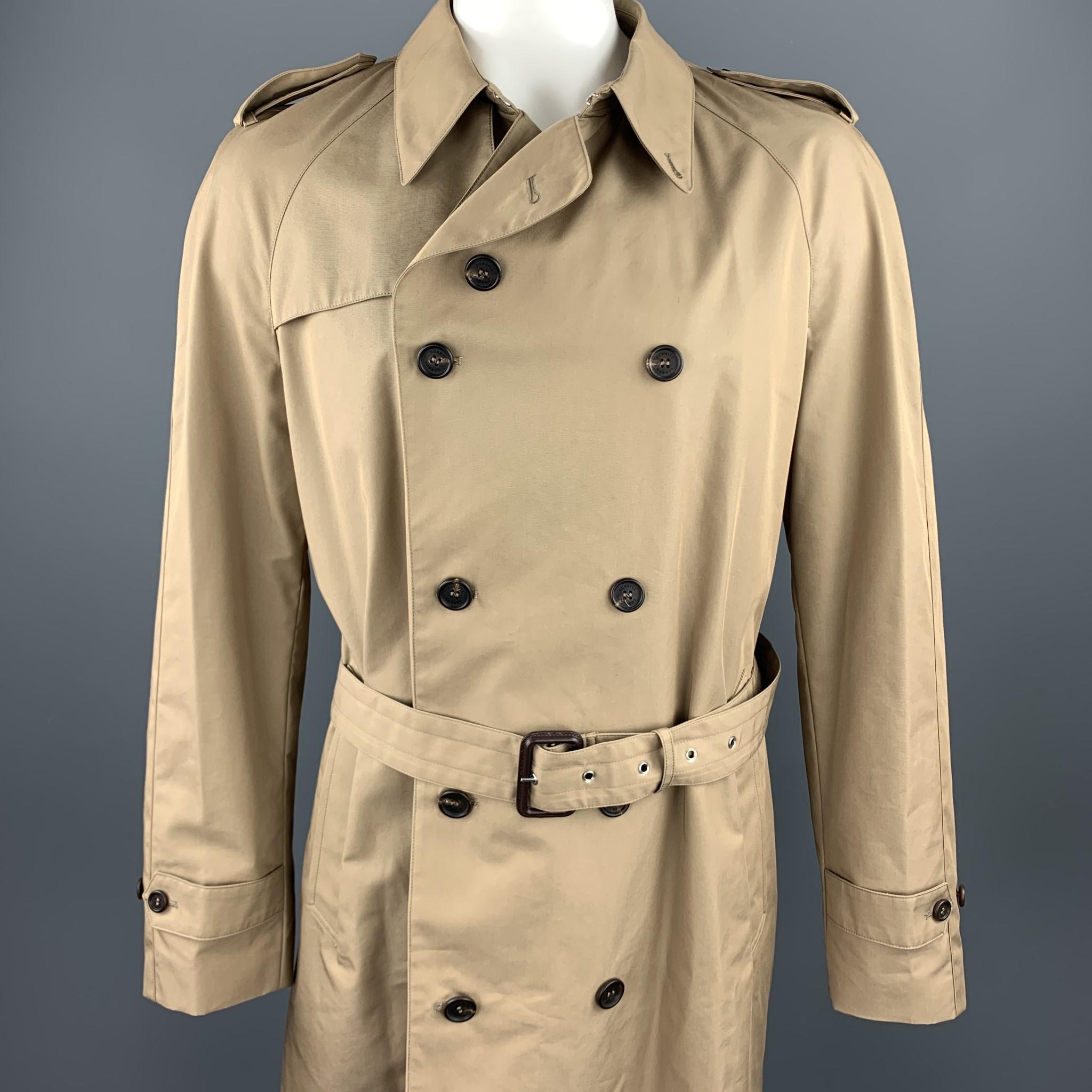 DUNHILL trenchcoat comes in a khaki cotton / polyamide featuring a belted style, epaulettes, and a double breasted closure. Made in Italy.

Excellent Pre-Owned Condition.
Marked: 2X

Measurements:

Shoulder: 18.5 in. 
Chest: 52 in.
Sleeve: 27.5 in.