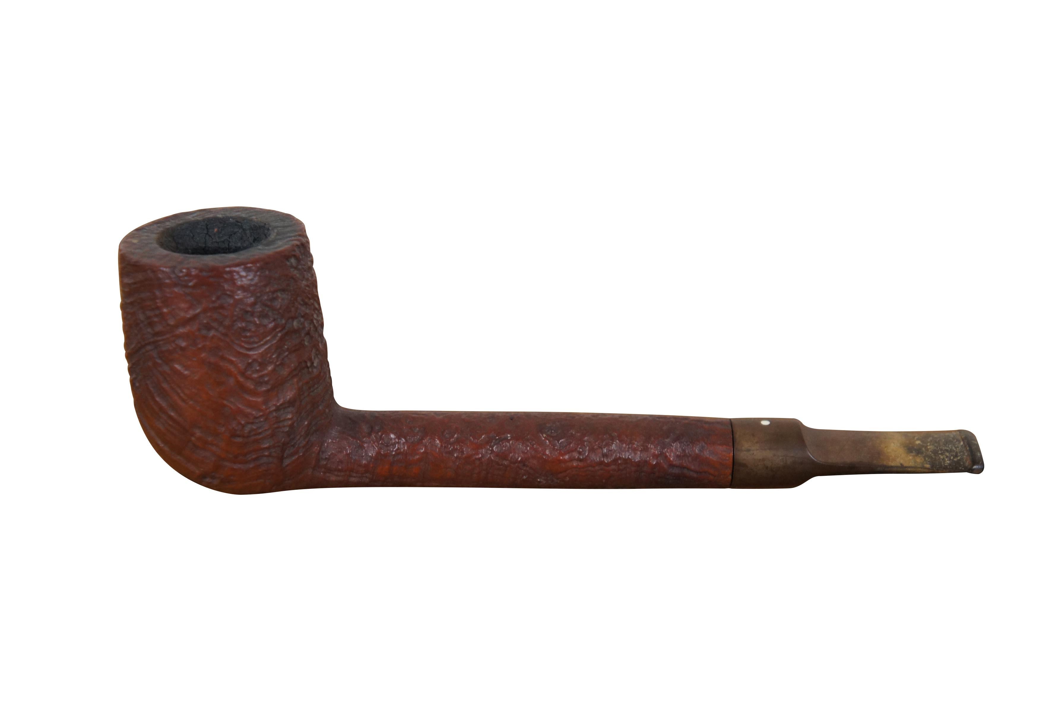 Pipa de brezo de Dunhill de los años 50-60, con forma de billar ODA 841 Lovat, boquilla de silla de montar y acabado Tanshell. Marcado: ODA 841 / Dunhill Tanshell / Made in England 2 / T.

Dimensiones:
6,5
