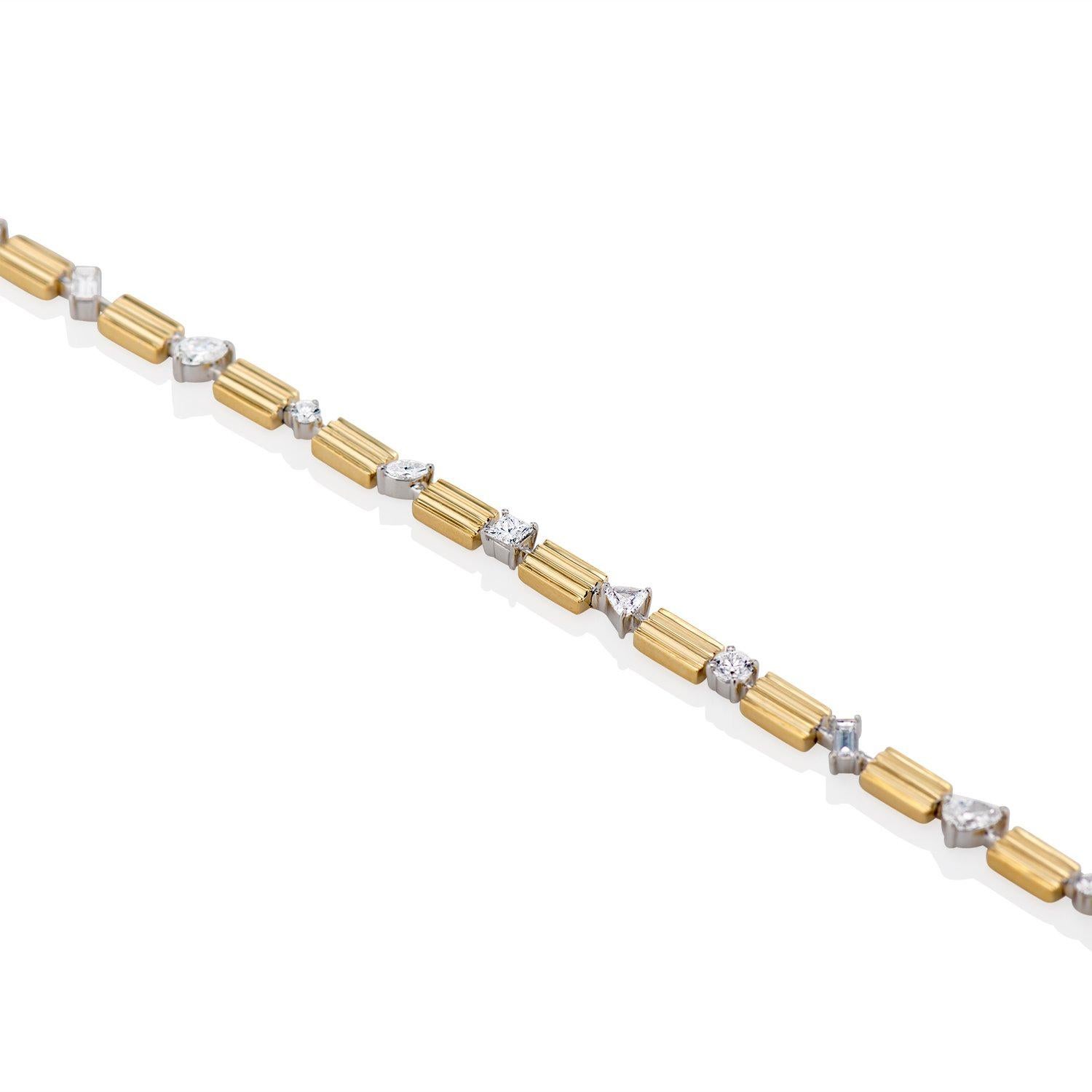 Duo Column Fancy Tennis Bracelet in 18k yellow gold with fancy-cut diamonds

- Round, pear, baguette, trillion, marquise and princess-cut G VS diamonds

- Total diamond weight: 1.40 carats

All our fine jewelry is made to order. A specialist will
