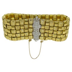 Bracelet tressé en or bicolore avec diamants