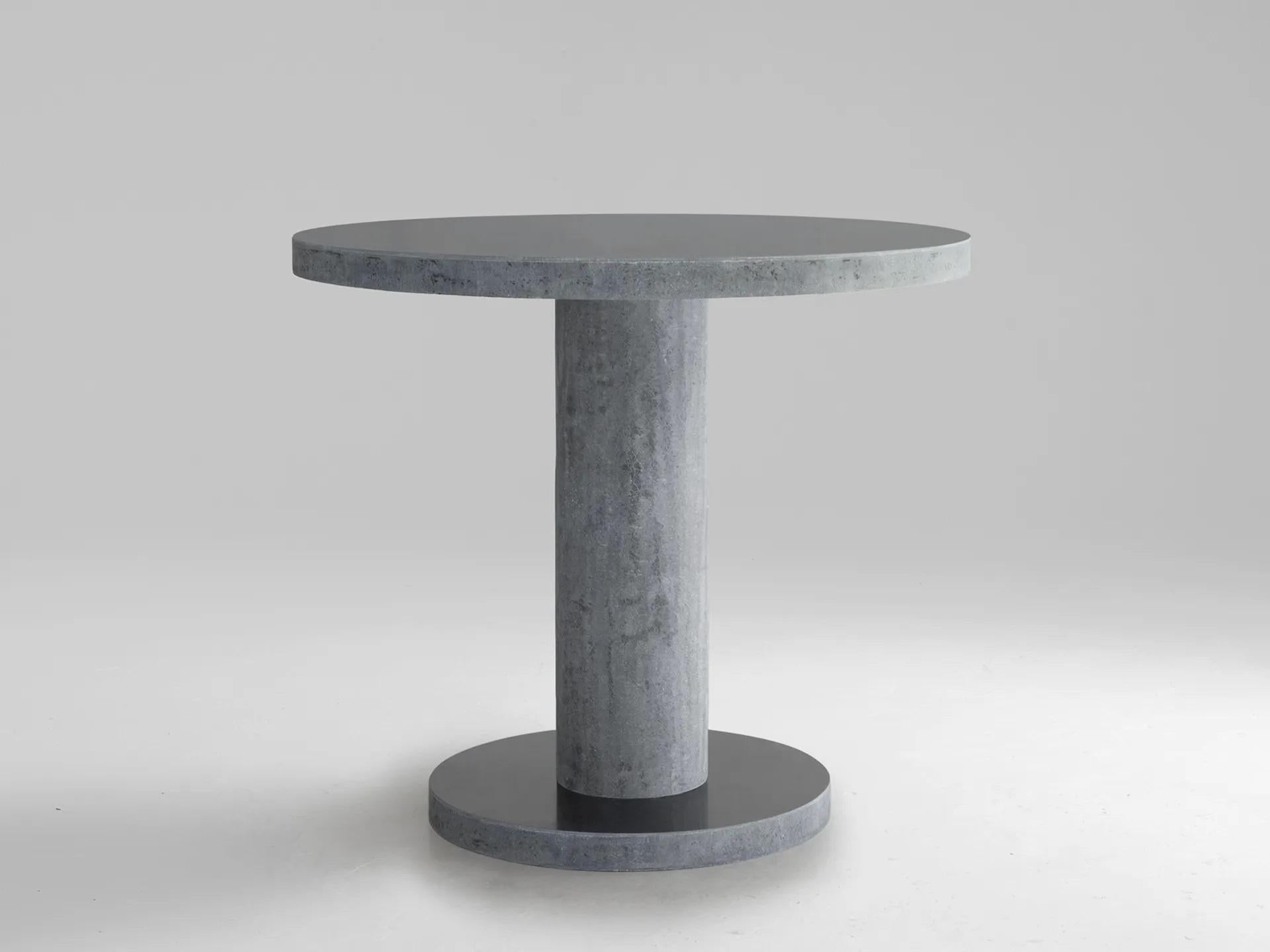 Du.o table by Imperfettolab
2021
Designer: Verter Turroni
Dimensions: Ø 90 x H 90 cm
Materials: Fiberglass
Available in black - raw Material and white- raw Material.

Two discs that approach and move away, following the Size of the cylinder