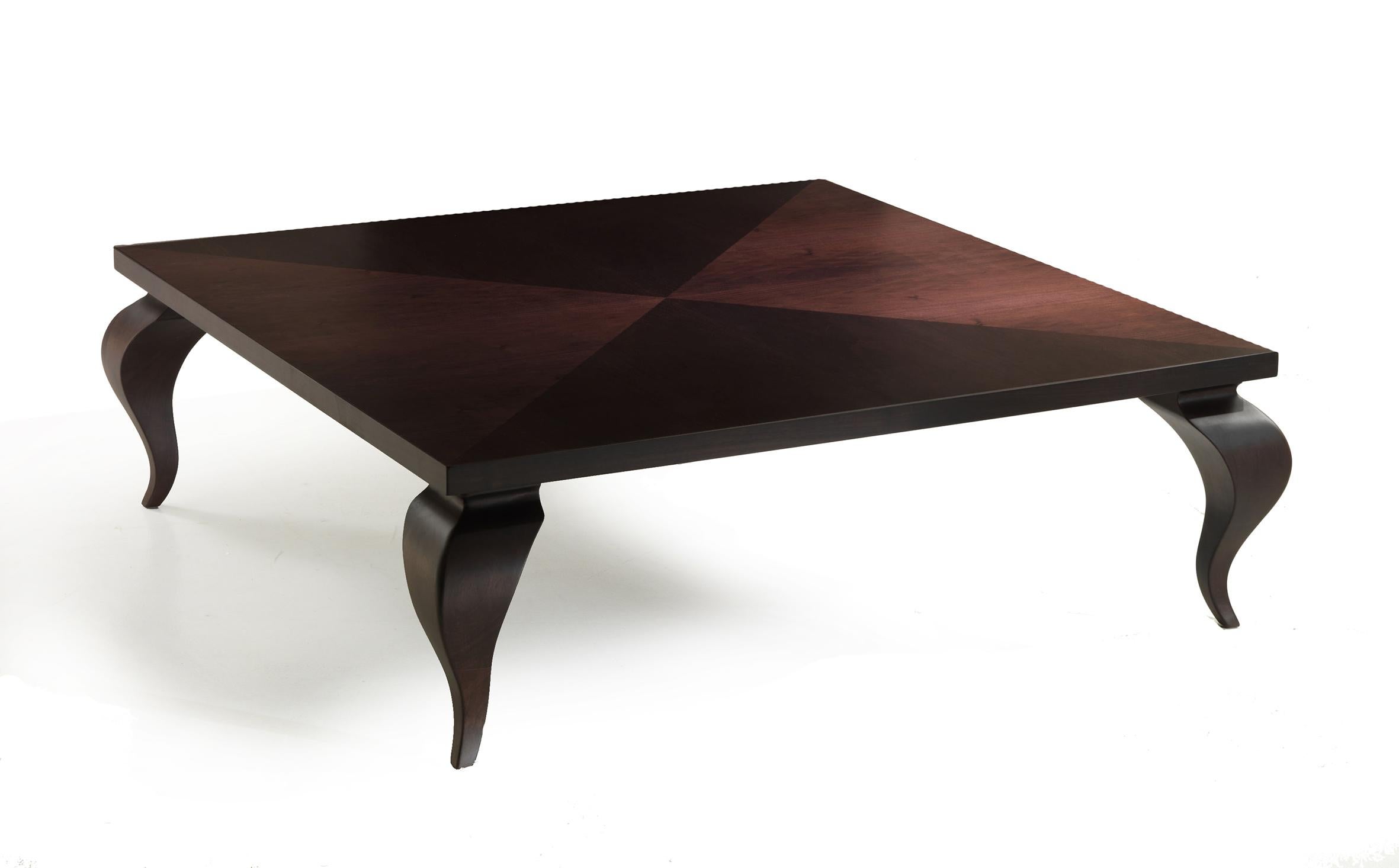 Introducing the Duon-ino cocktail table, a masterpiece of design envisioned by the talented Aldo Cibic. This handcrafted Italian creation is a celebration of contrasts, where a large square surface with angular precision meets the exotic allure of