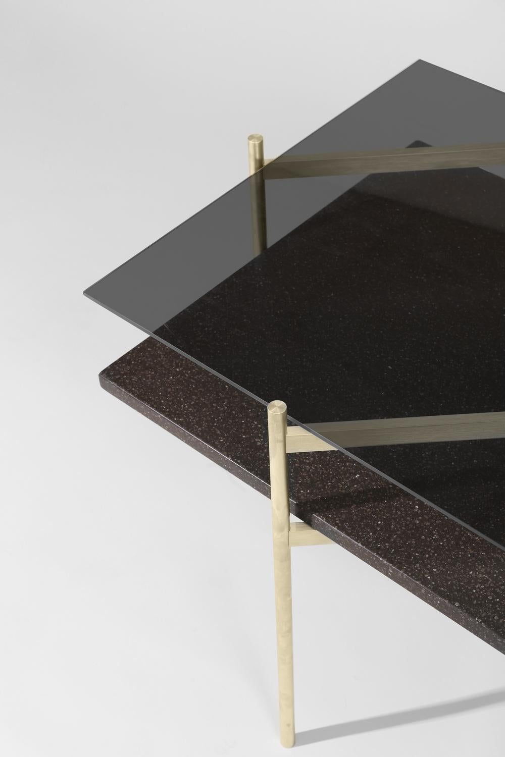 Made to order. Please allow six weeks for production.

Brass frame / Smoked glass / Black mosaic

The Duotone Furniture series is based on a modular hardware system that pairs sturdy construction with visual lightness and a range of potential
